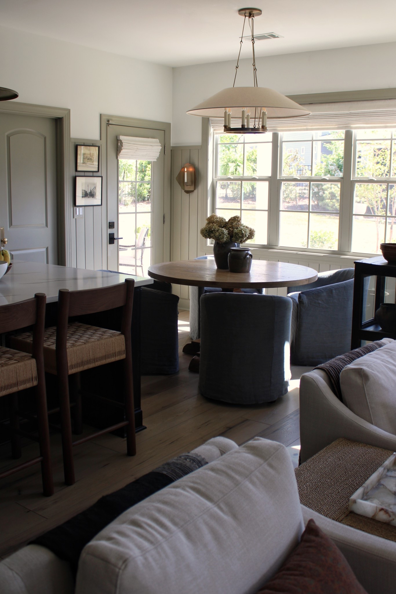 Dining nook, Roman shades, kitchen, round dining table, archive chandelier, large pendant light 

#LTKHome