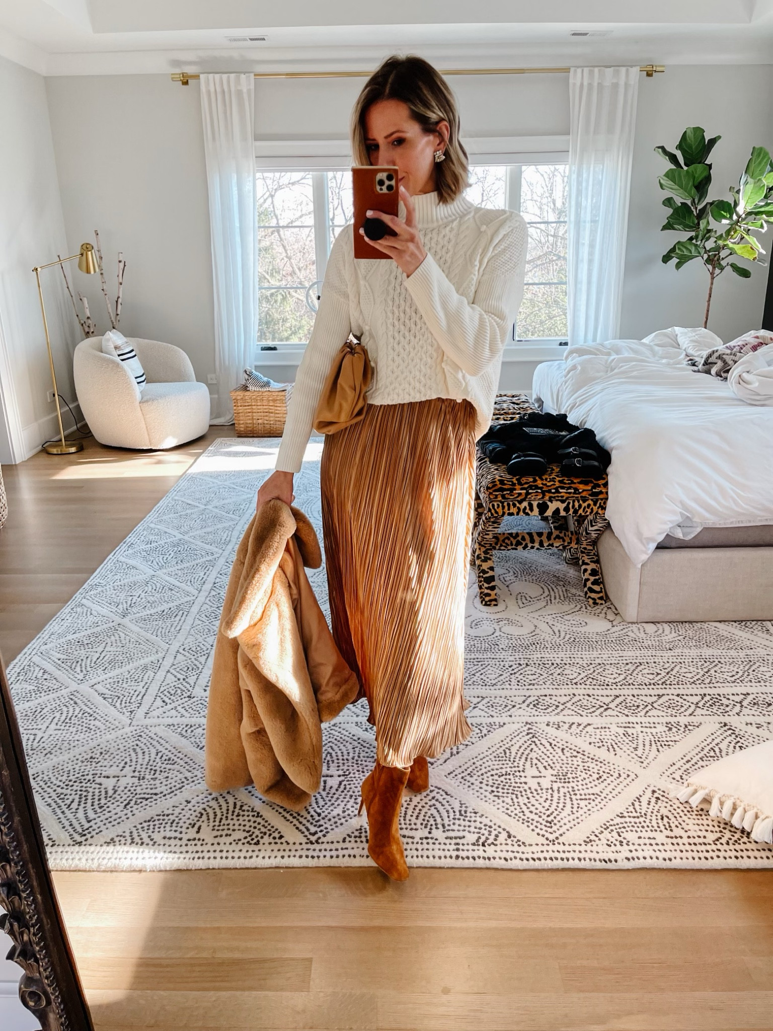 NYE outfit idea: gold rated skirt and sweater 

#LTKstyletip #LTKHoliday #LTKSeasonal