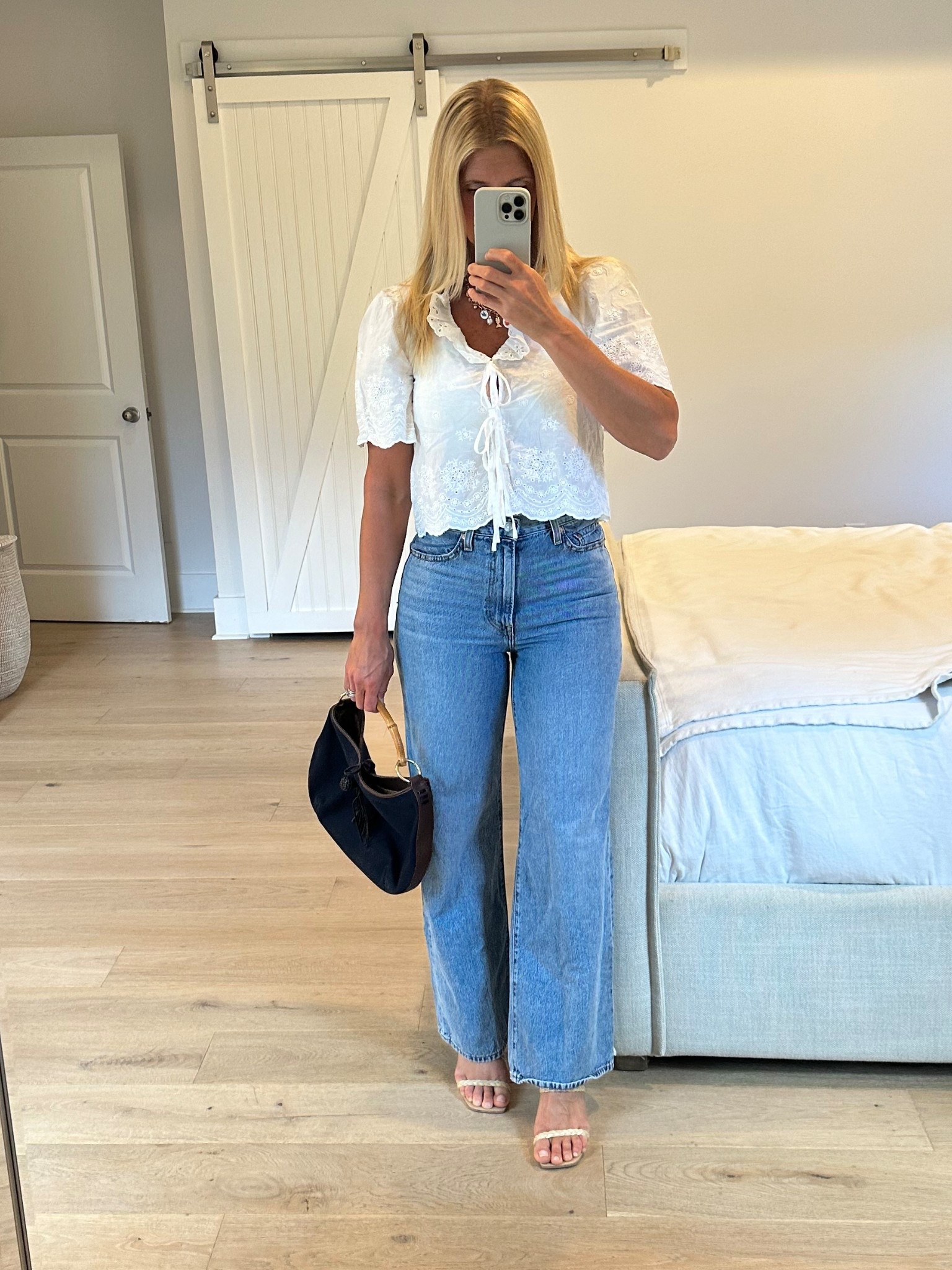 Out to dinner summer casual outfit. The length of the jeans were perfect. Loved this top it has little eye hooks to keep the closures where the ties are in place. Threw in rattan heals with a bamboo handle handbag.

#LTKFindsUnder100 #LTKSaleAlert #LTKOver40