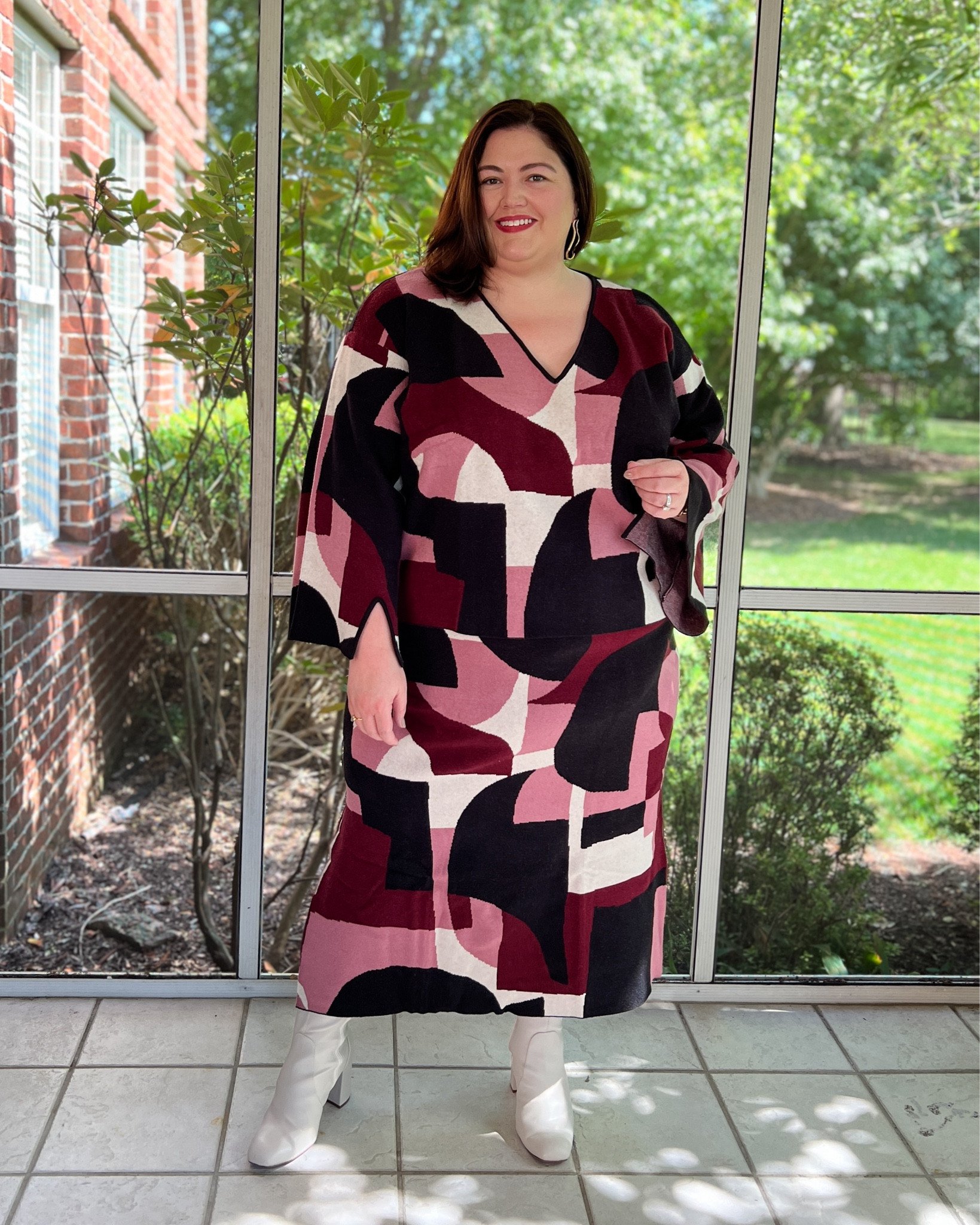 This plus size sweater set is so fun for fall. Love the rich plum and burgundy shades. I paired with a pair of stretch wide width ankle boots. I am usually a size 28, but sized up in this to make sure there was enough length in the top with my long torso. I could definitely take my usual size in this, though.

Plus Size Fall outfit idea ✨ plus size sweater and skirt set. #ltkcurves 

#LTKplussize #LTKover40 #LTKSeasonal