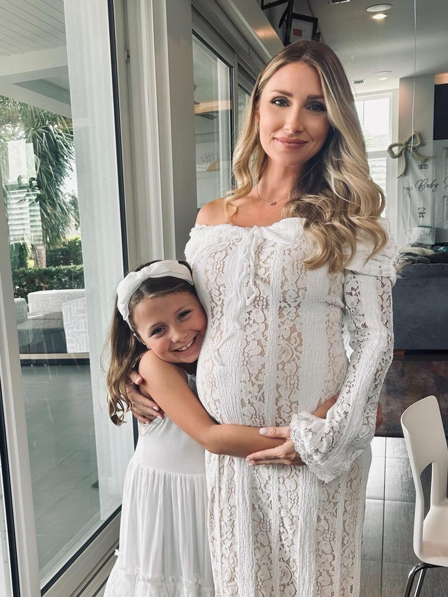 chose this bump friendly lace off the shoulder dress for my baby shower to match my mini me. It has plenty of stretch for my growing belly and was so comfortable. I sized up one size from my non maternity size to a Small.

#LTKFamily #LTKBump #LTKStyleTip