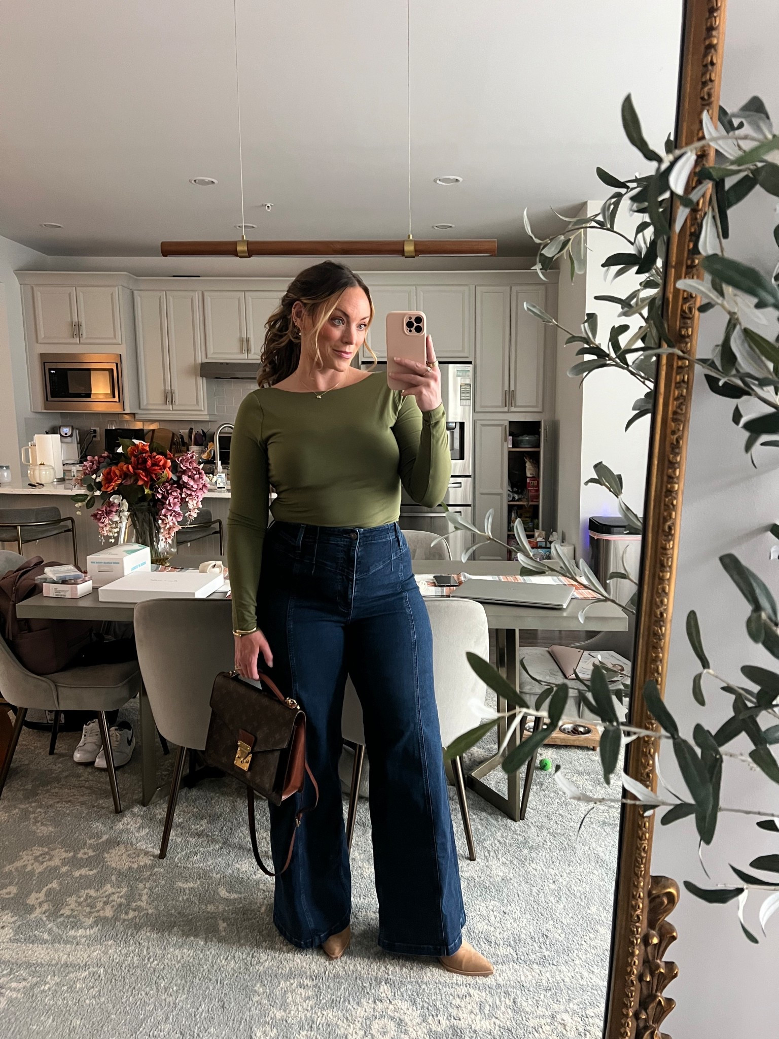 Gorgeous green top with a cut out in the back! Comes in a few colors!

#LTKMidsize #LTKSeasonal