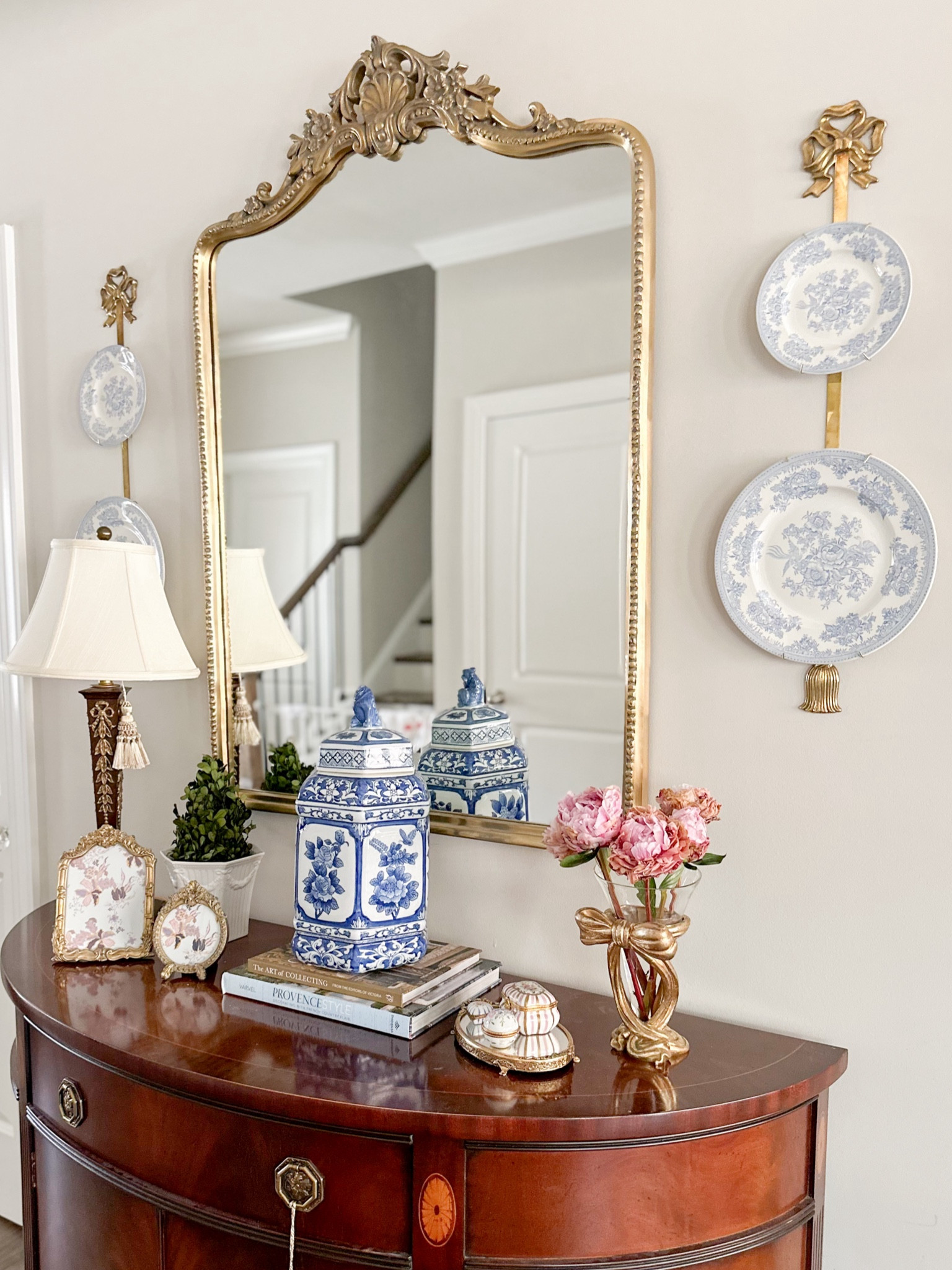 Console styling, blue and white plate wall 

#LTKhome #LTKMostLoved #LTKfindsunder100