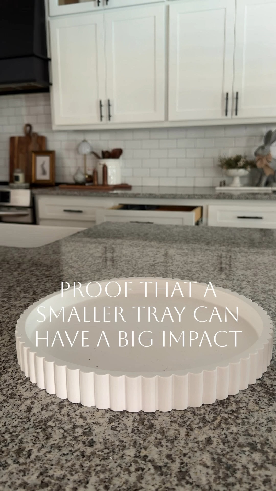 I am loving this fluted white tray. It’s perfect for those smaller spaces where you still want something styled, but not overdone. I added some dried peonies, a pair of brass candlesticks with flameless candles, and a simple butterfly to finish it off.

It’s soft, easy, and one of those looks that just feels right! 