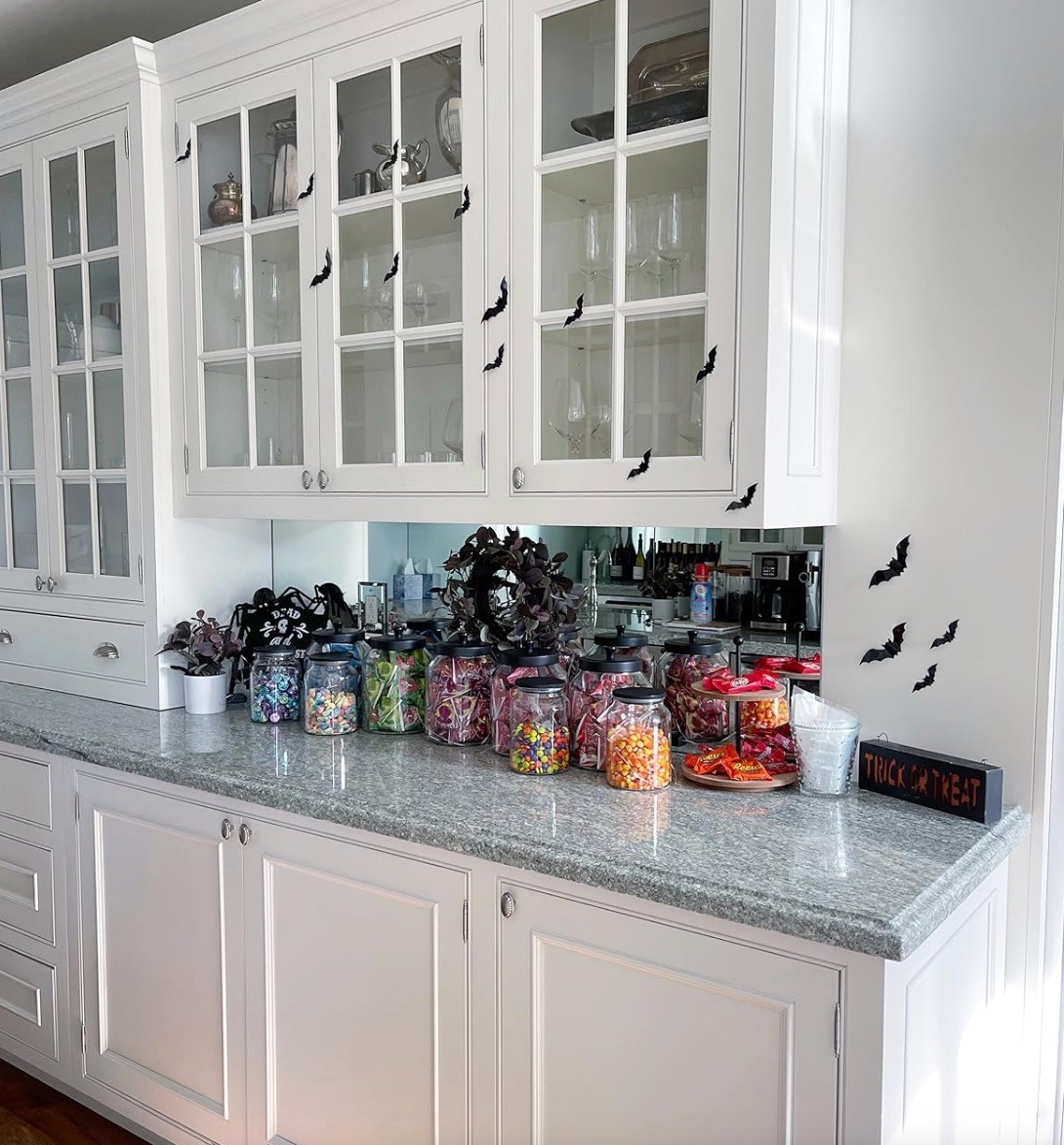 Turn post-Halloween candy chaos into something fun and organized. Glass jars and lidded canisters make it easy to sort, display, and store all the treats while keeping your counters looking tidy.

#LTKHoliday #LTKHalloween #LTKHome