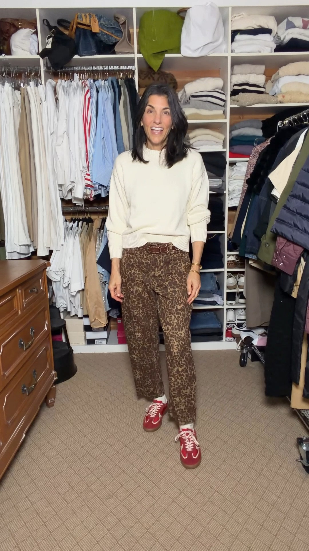 Animal print jeans, a sweater and sneakers