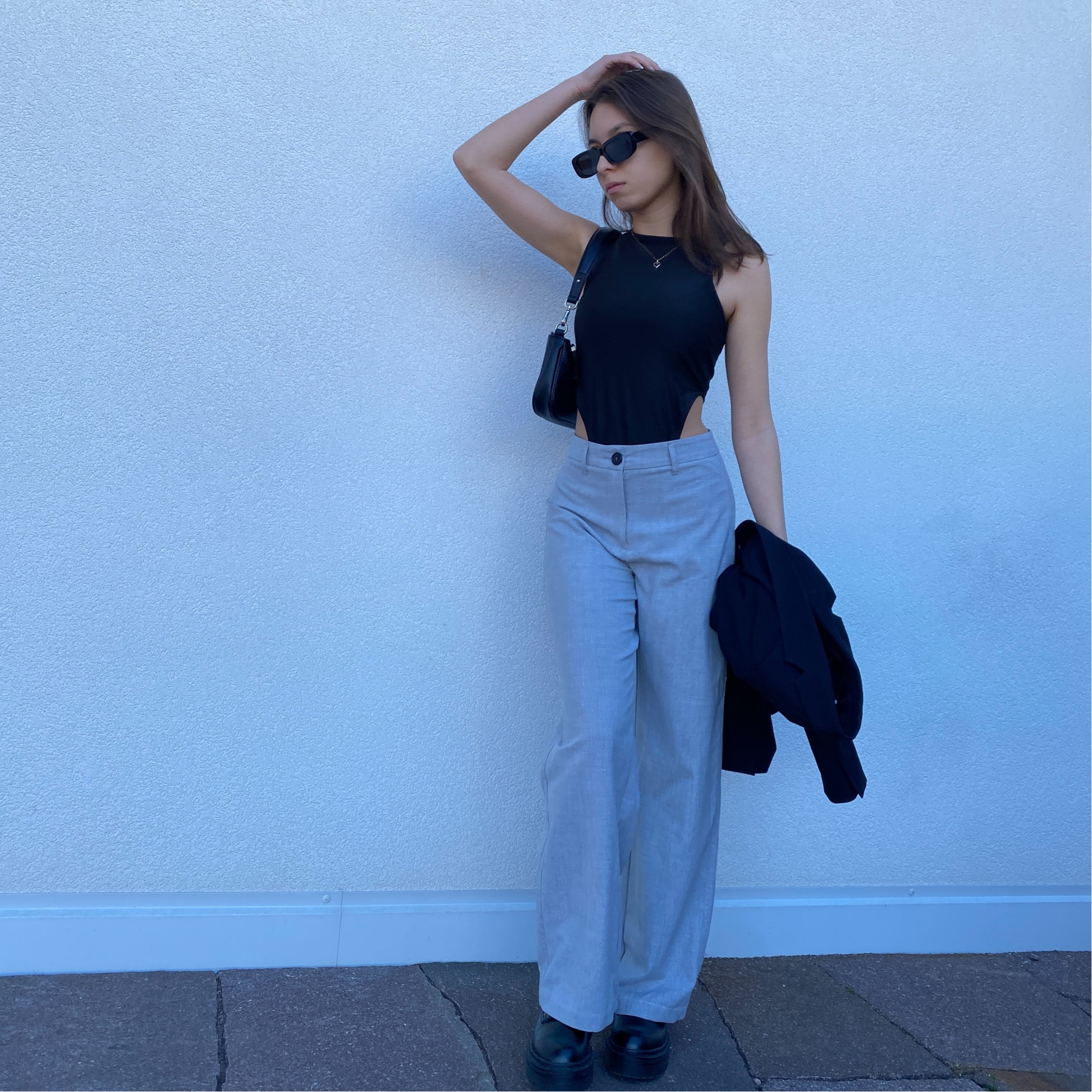 Grey pants, black bodysuit, black boots, black blazer, black handbag

#LTKstyletip #LTKfit #LTKeurope