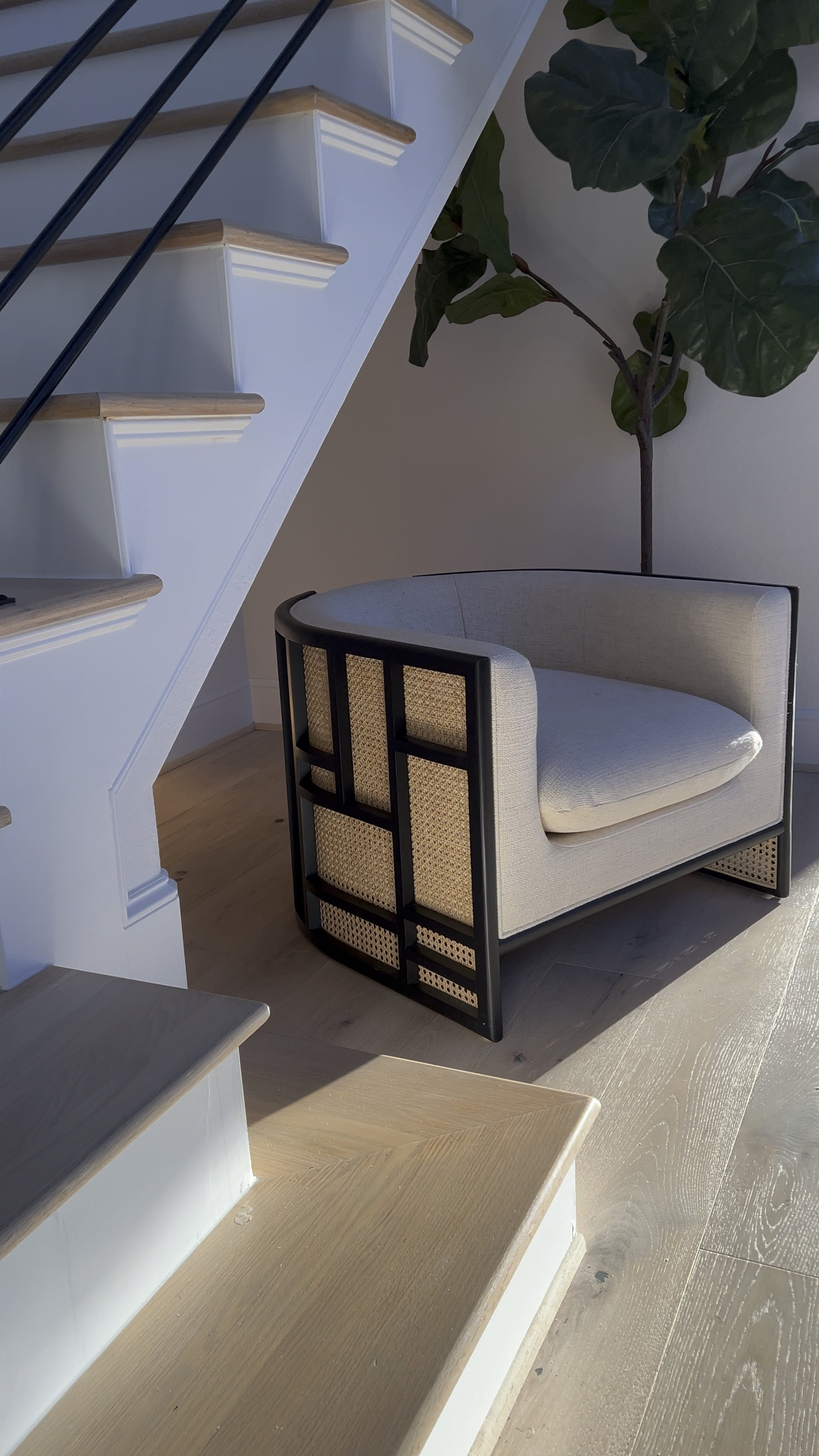 
This chair is truly classic!… I 💯 believe this is one of the few rattan pieces that will stand again test of time/trends. ☺️🎉 

It comes in two color options and is the perfect piece if you love curved furniture. Let’s talk about the design for a second - I mean, just breathtaking! …. Even better in person 🥰 I love low & wide profile furniture pieces bc they make especially smaller spaces feel larger. This accent chair is a great addition to any space. 🖤🤍

 I’ve had these accent chairs for almost two years and the fabric/threads are incredibly durable and stain resistant and have only lightly cleaned them once! 🎉 

#LTKsalealert #LTKhome #LTKVideo