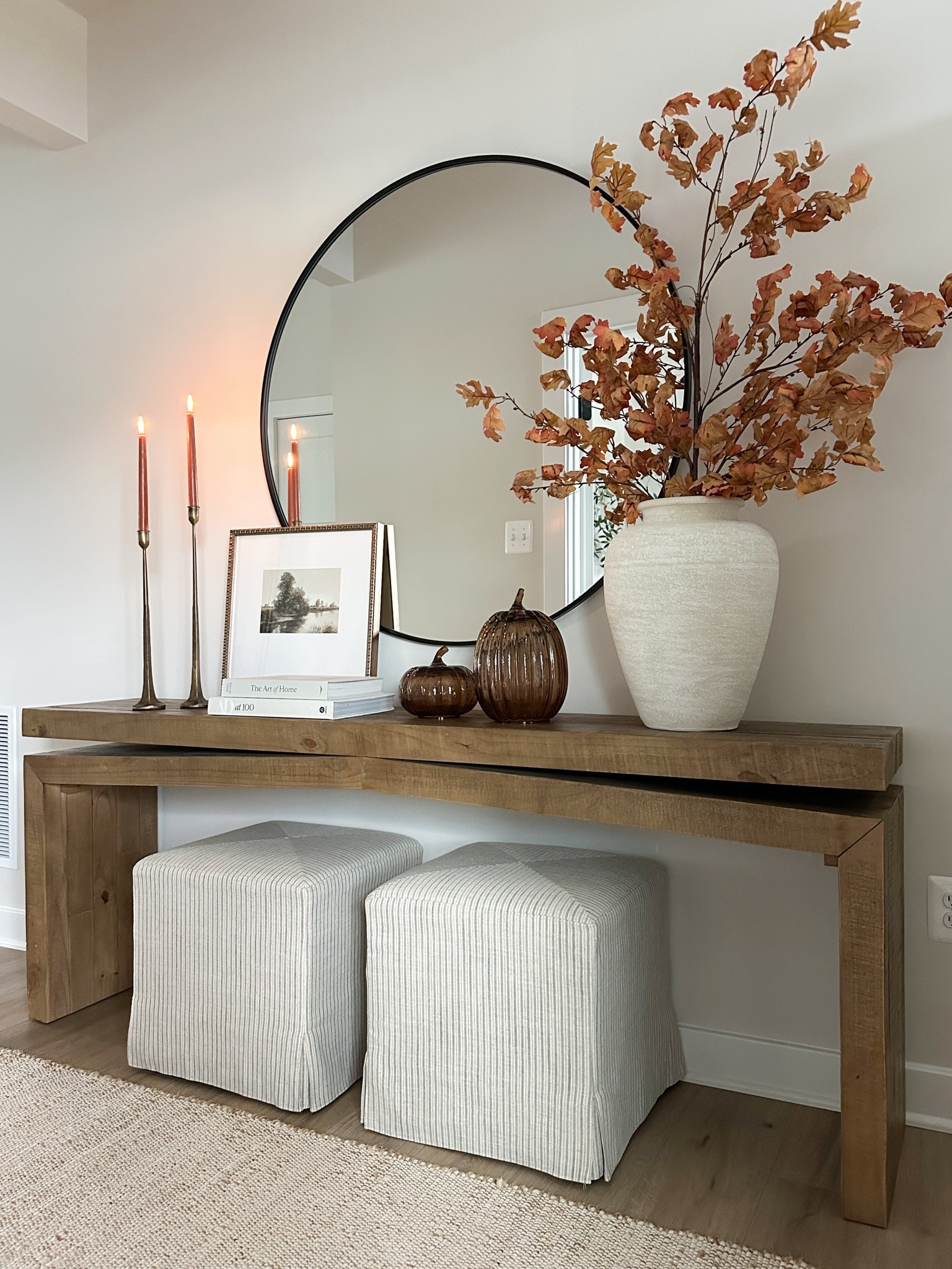 #ad My favorite console table and oversized round mirror! The pairing is just beautiful, timeless and add warmth to the space. @Wayfair 

#wayfairpartner #wayfair #consoletable #mirror #entryway #falldecor #homedecor #rug

#LTKHome #LTKSaleAlert #LTKSeasonal