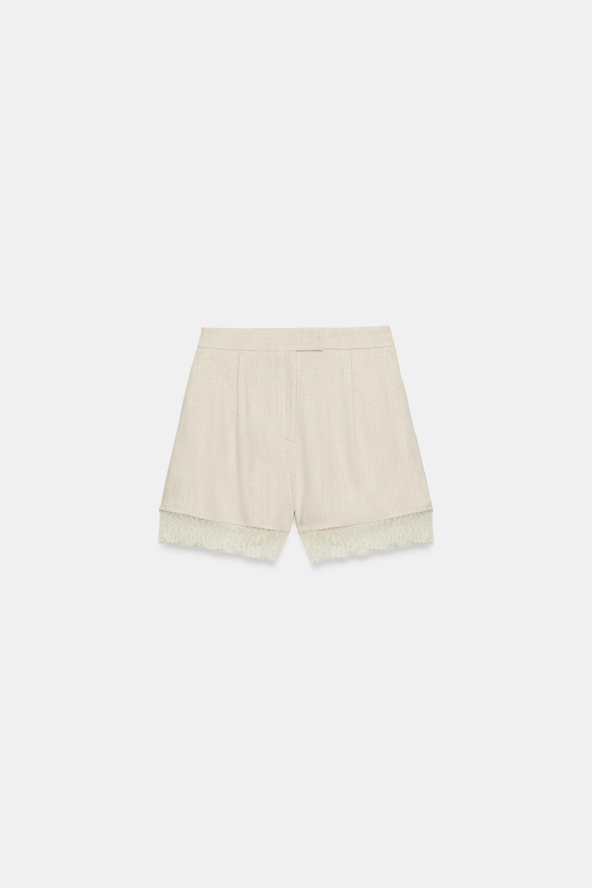 High-waisted shorts with front pleats. Front pockets and back false welt pockets. Hem finished wi... | Zara US