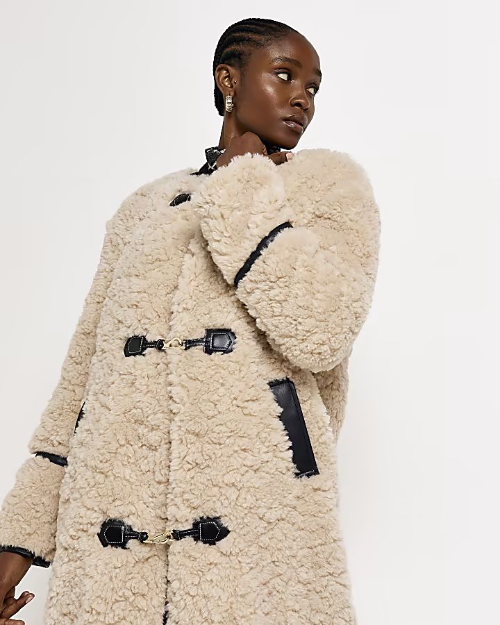 Beige faux fur longline coat | River Island (US)