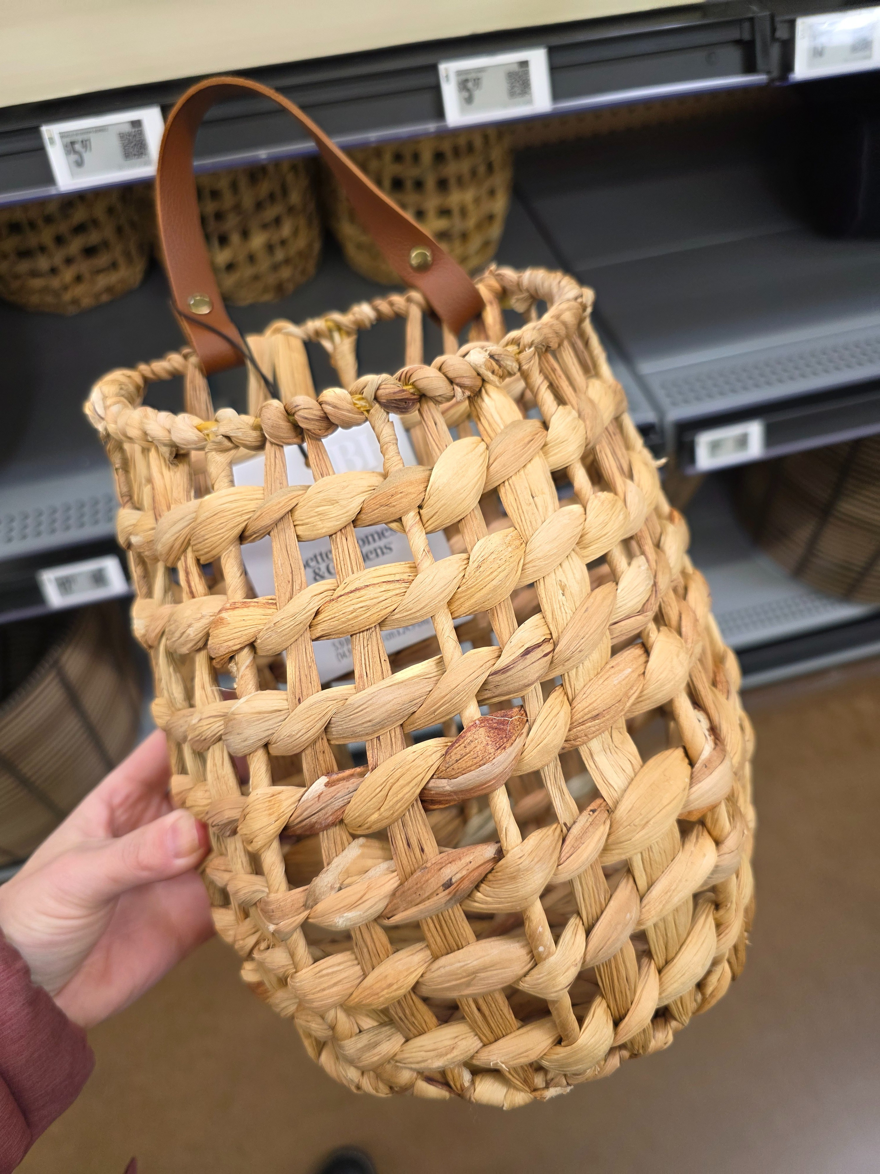 Woven wall basket that adds instant warmth and texture 🤎 This water hyacinth hanging basket features a beautiful handwoven design with a faux leather strap for a slightly elevated look. Perfect for styling faux stems, greenery, or adding a natural touch to walls, doors, shelves, or entryways. Such an easy, budget-friendly way to bring in that cozy, layered feel. #walmartfinds  

 #LTKHome