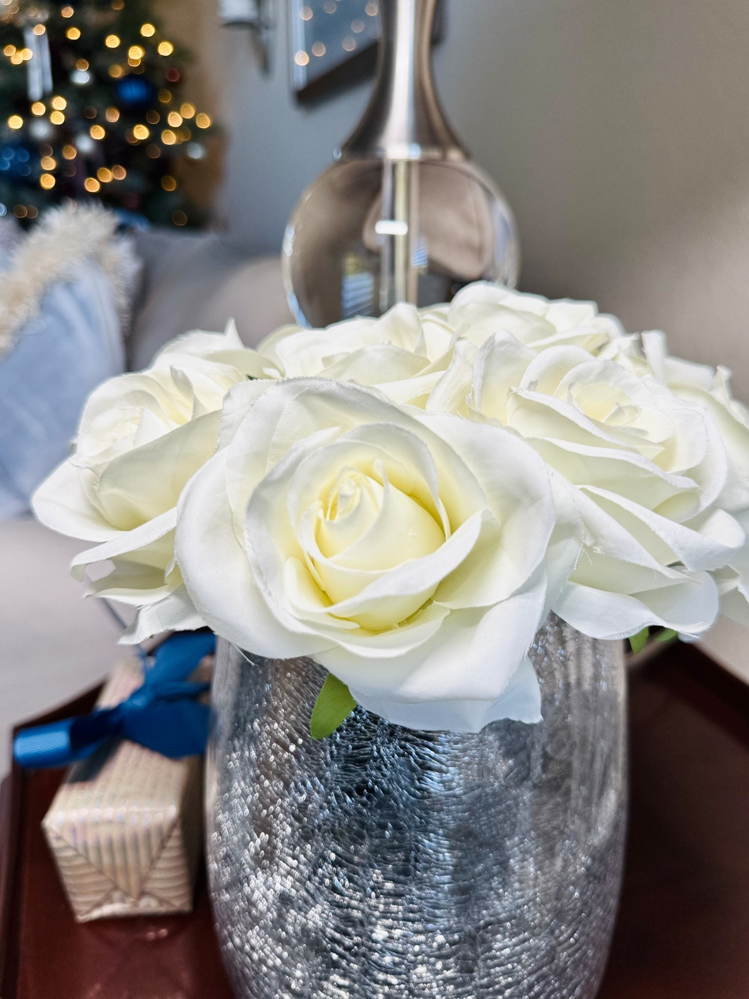 🌲🤍Elegant Holiday Centerpiece! I created this simple centerpiece, to style on our side table, using white silk roses from Amazon!



#LTKFindsUnder50 #LTKHoliday #LTKHome