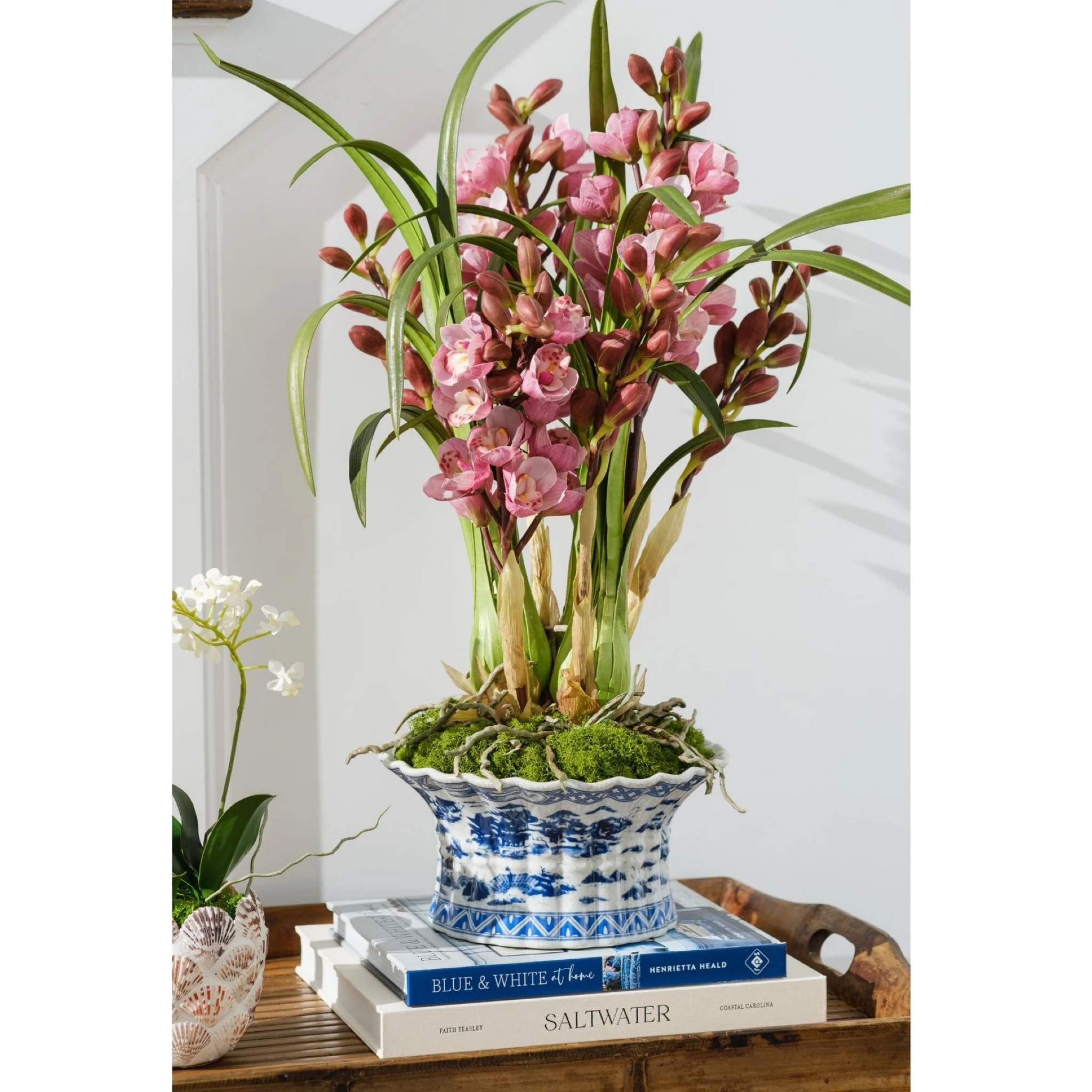 Faux flowers are so realistic nowadays! this beautiful orchid in a chinoiserie planter is the perfect example!!

#LTKHome #LTKStyleTip