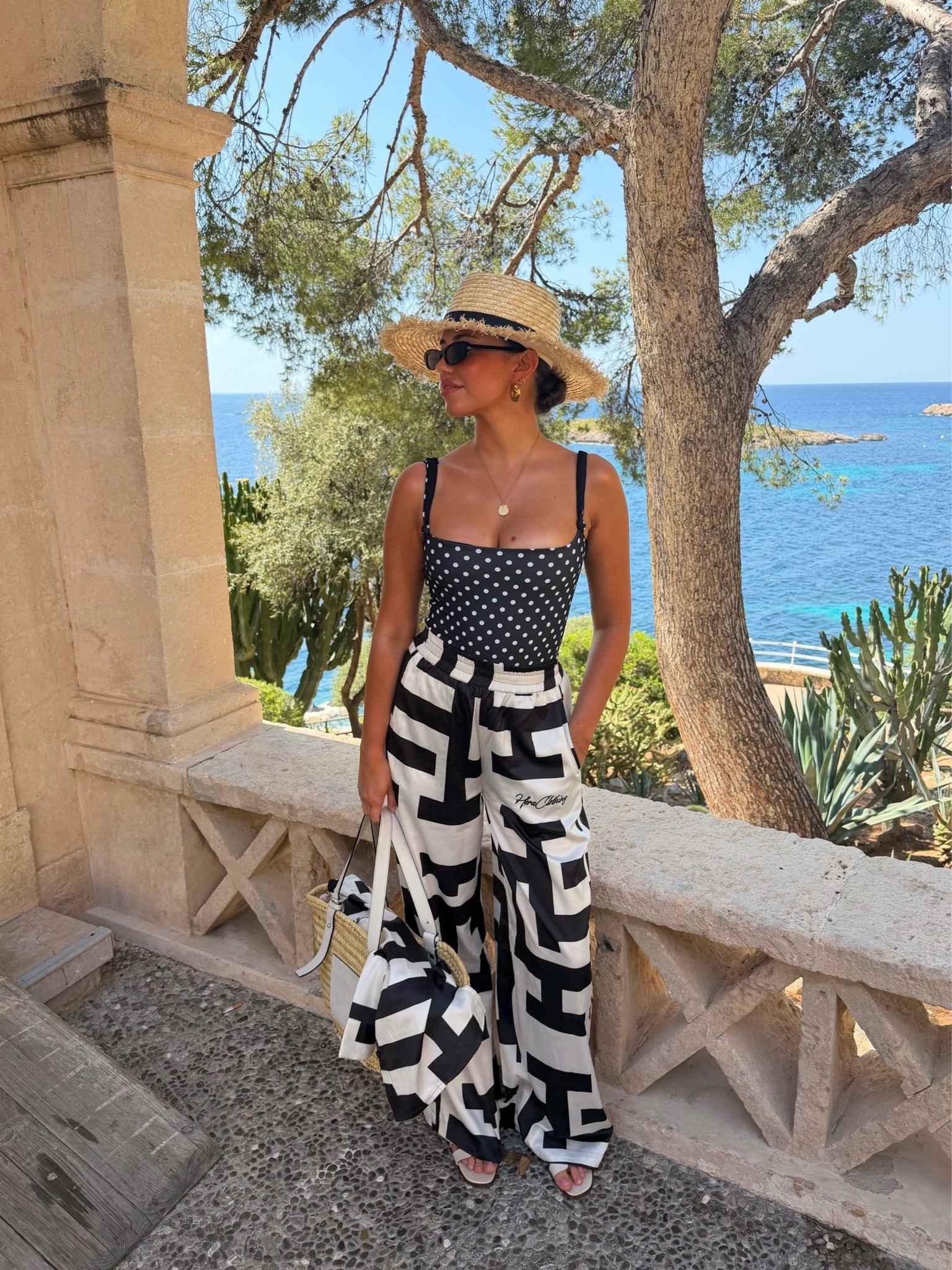 Get me back to the beach club ASAP!!!🌴☀️ a backdrop so incredible it looks like a fake!!

Comment LINK and I’ll send the outfit links to your DMs! 🥰

Swimsuit is @kaselastudio (sold out in this pattern 😭) but they have the best swim, I’ve worn them for years! I’ve linked some similar on the LINK feature too!

Use code PHEEBS for 15% off my shirt and trousers set 🥰