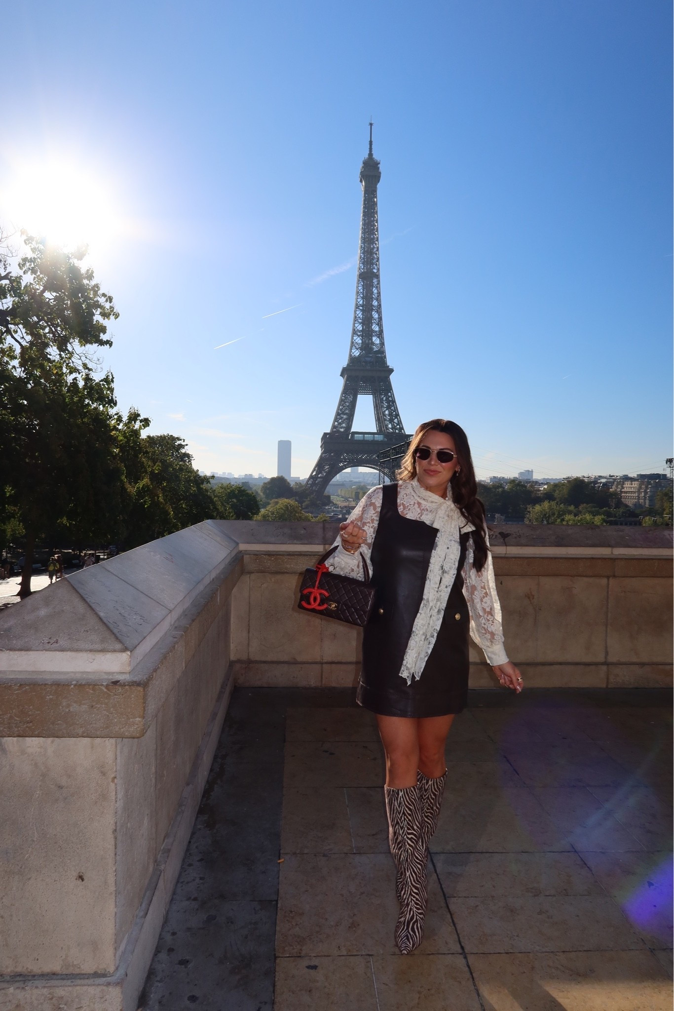 curvy midsize fall look! wearing size medium in lace long sleeve bow top and size 8 in chocolate brown faux leather dress 🤎 obsessed with my zebra boots! they are fabric and so lightweight. what i wore for a day of shopping and eating in Paris!

#LTKSeasonal #LTKMidsize #LTKTravel