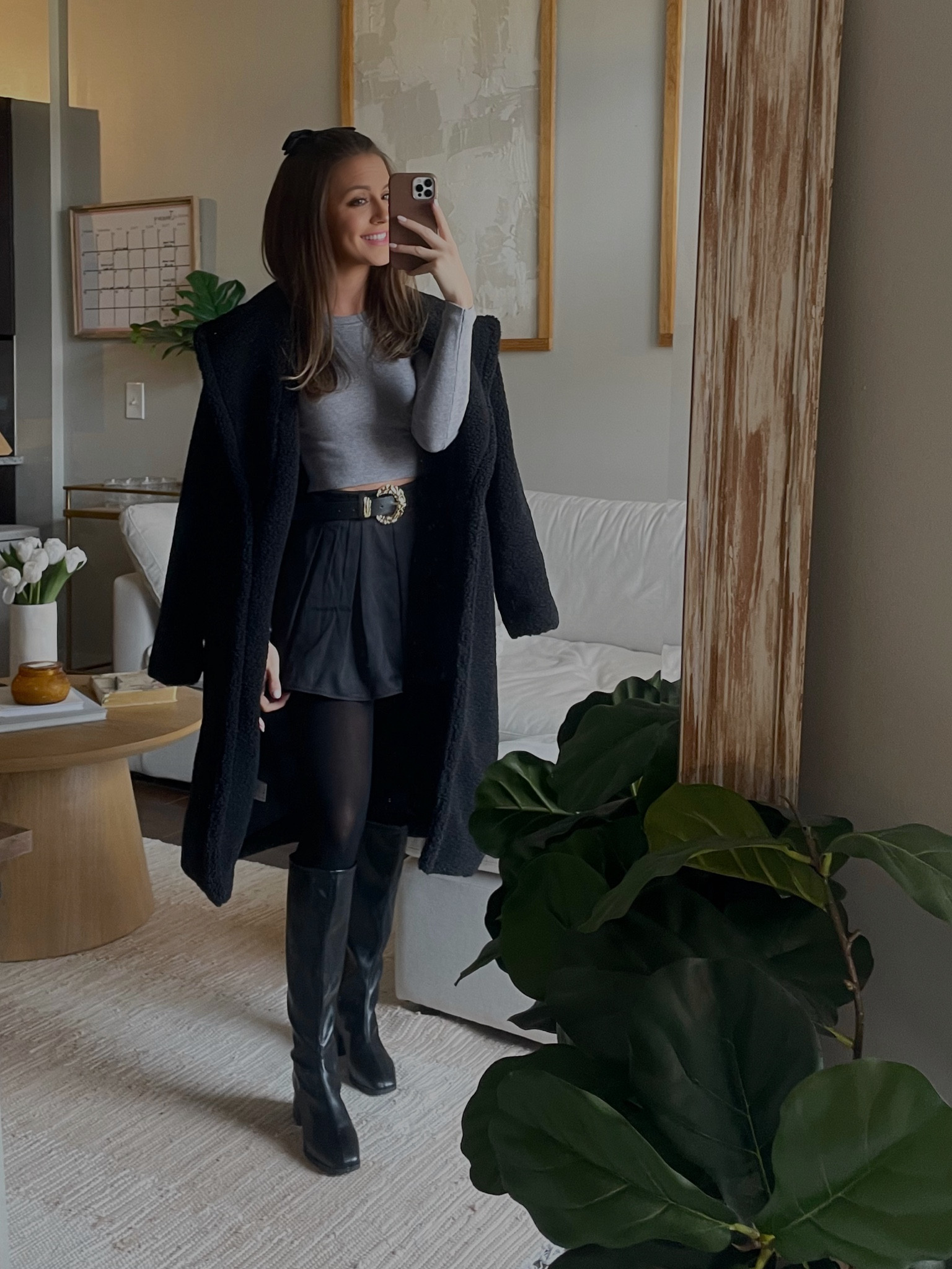 Such a cute winter outfit i'm loving mix and match neutrals 🤍

Pleated skirt - wearing XS (runs big) 
Knee high black boots - wearing a 6 & run true to size 
Black teddy trench coat - wearing a small and runs a bit big!

#LTKsalealert #LTKfindsunder50 #LTKstyletip