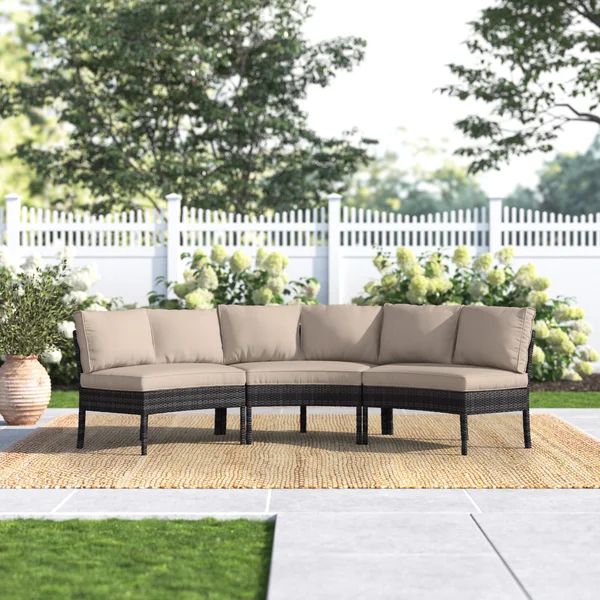 Burmeister 118'' Wide Outdoor Wicker Curved Patio Sectional with Cushions | Wayfair North America