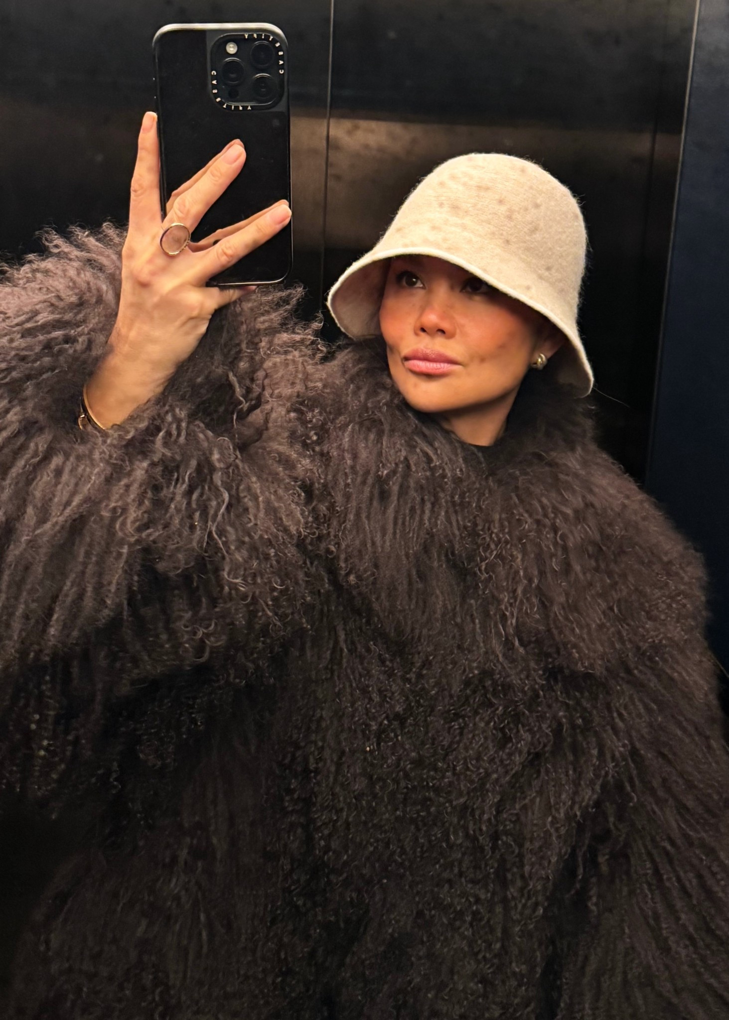 Favourite look in this brown shearling Mongolian fur coat with a bucket hat  

#LTKstyletip #LTKluxury #LTKwinter