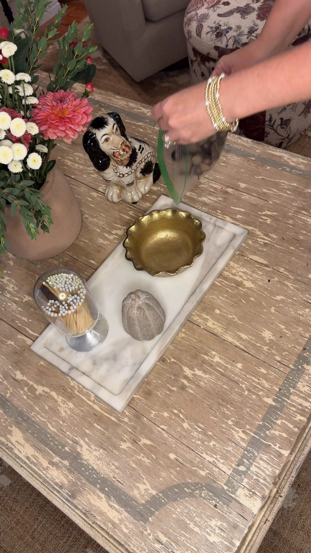 Time to bring out my artificial acorns. I enjoy collecting real ones, but they’re not pet friendly so I love the realistic look of these. Also linking my coffee table, ottoman, rug, gold decorative bowl, and staffordshire dog figurines. And the match cloche. Coffee table decor and styling

#LTKHome #LTKSeasonal #LTKSaleAlert