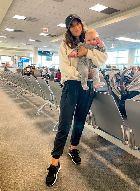 Airport fashion. Oversized sweatshirt & joggers. What I’m wearing is no longer available so I linked similar items. 

Sneakers fit 1/2 size small size up. Use code:thedarkplum10off for 10% off! 

#LTKfindsunder50 #LTKtravel #LTKfitness
