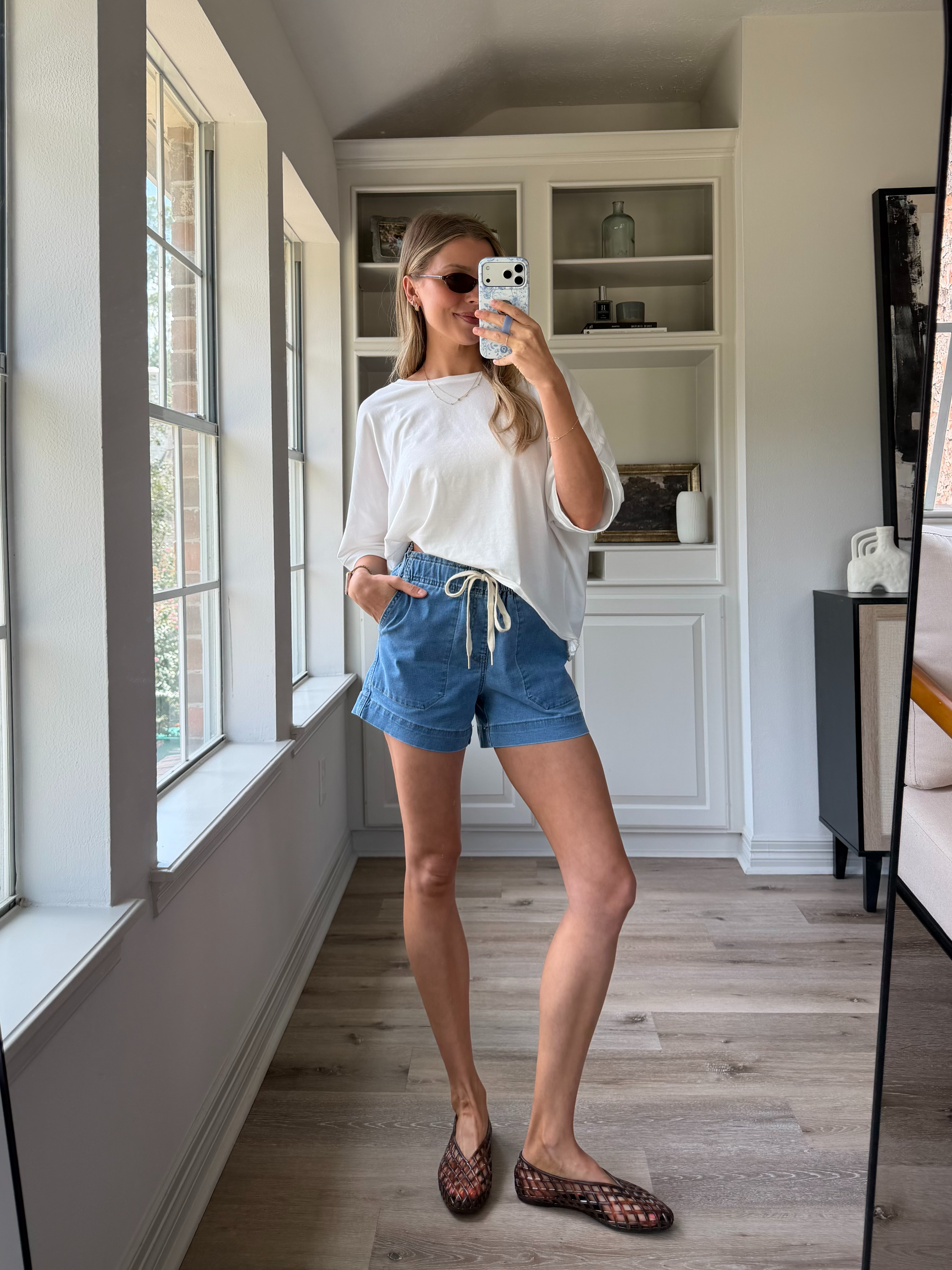 Cute, casual mom outfit! Wearing S in tee and stretchy shorts! #founditonamazon
 

 #LTKootd #LTKmomlife