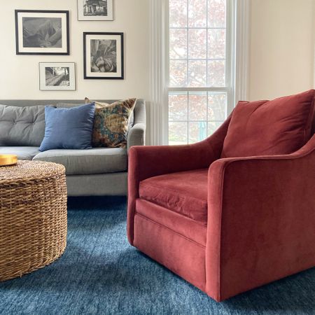 Living room, red, blue, blue rug, red velvet chair, woven coffee table, round coffee table 

#LTKhome