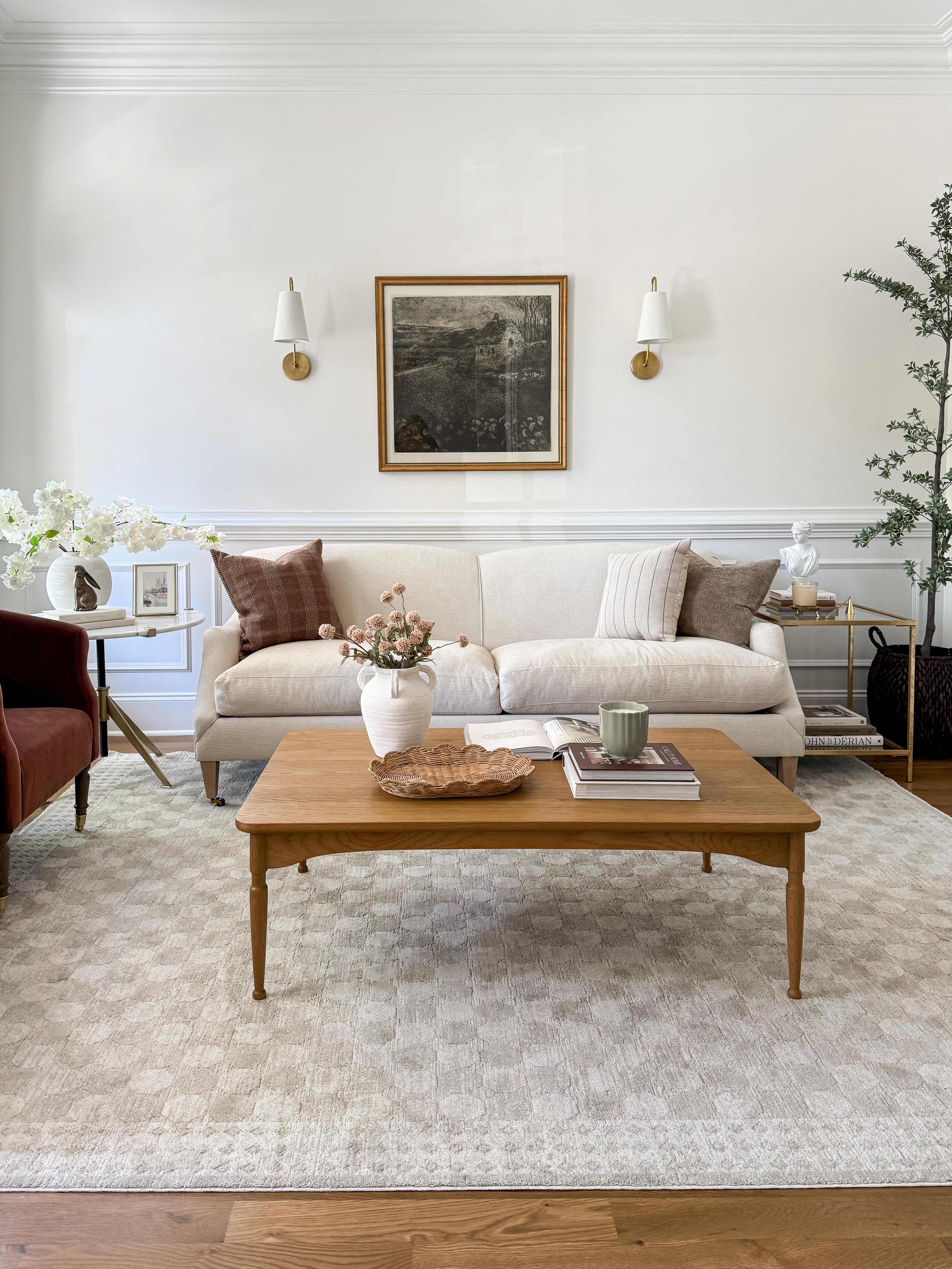 Shop my sitting room after I gave it a spring refresh! Area rug, table, sofa, chairs, artwork, McGee & Co, spring, sconces, olive tree, side table, home depot, Amazon finds, florals, vase, pillows 

 

#LTKSeasonal #LTKHome #LTKSaleAlert