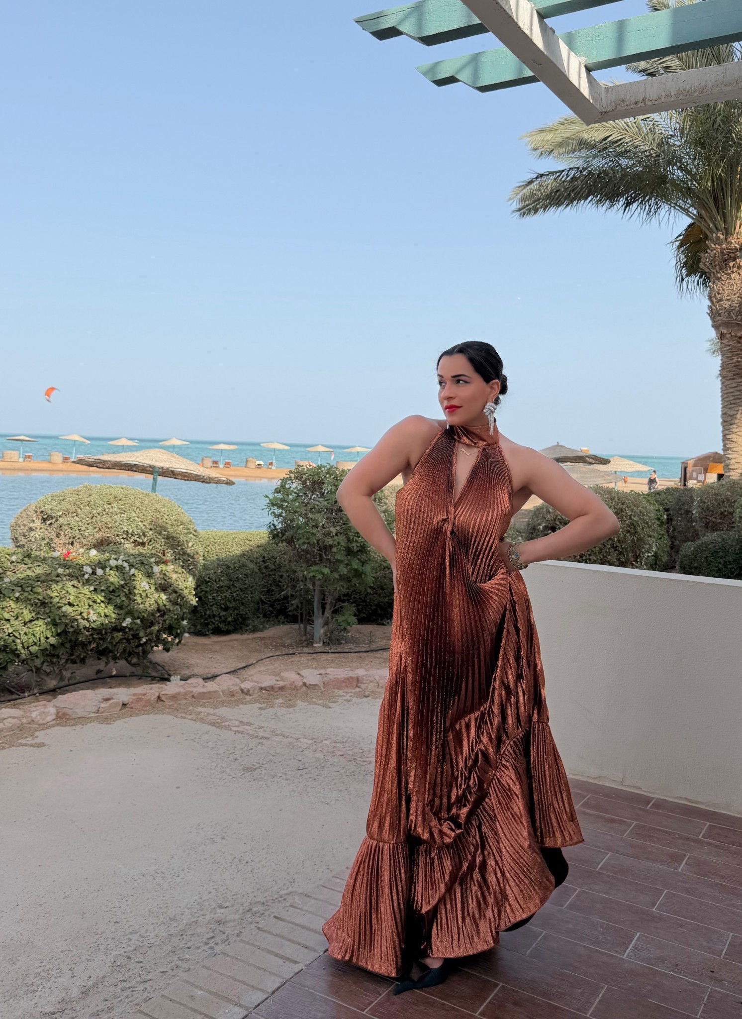 Sunset glow but make it liquid bronze 🤎✨

This gown is EVERYTHING — the metallic pleated fabric literally moves like water & catches the light in the prettiest way! 

Perfect for vacation nights, weddings, or any moment you want to feel elevated without trying too hard! 

Paired it with statement crystal knot earrings & a bold heel for that full glam finish.
Shop it on my LTK & save this for your next dressy moment ✨

bronze gown, metallic dress, pleated maxi dress, vacation outfit, wedding guest dress, formal dress, evening gown, statement dress, elevated style
#ltkstyle #ltkfashion #ltkweddingguest #vacationoutfit #resortwear #eveninglook #weddingguestdress #amazonfinds #designerinspired #styleinspo

#LTKBump #LTKgrwm #LTKTravel