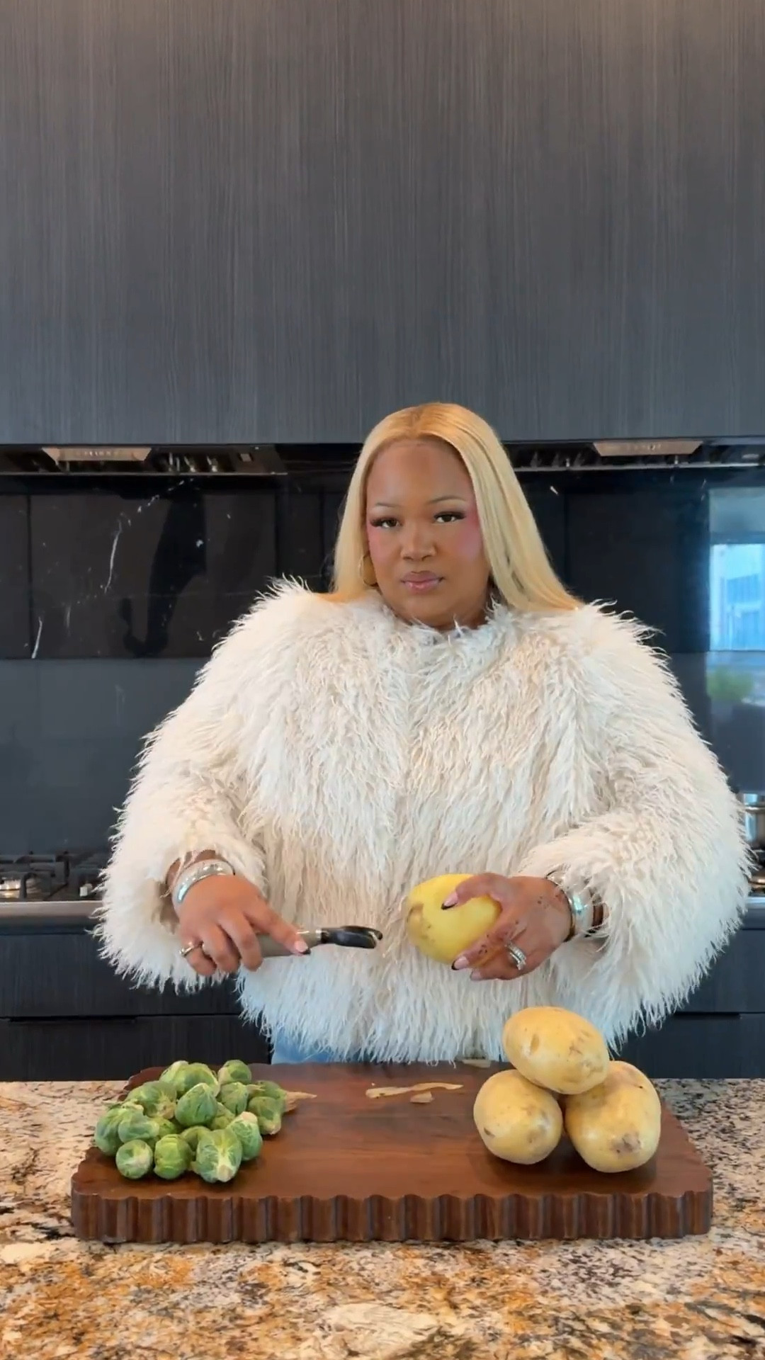 thanksgiving outfit inspo and recipes🧡 
both of my outfits are from torrid and can be worn for thanksgiving and upcoming holidays. 
I’m wearing a 2 in the coat and a size 22 in the jeans.
For the second outfit, I’m wearing a 4 in the sweater and 2 in the tights. 

Recipes:
Balsamic Roasted Brussels Sprouts with Crispy Turkey Bacon

Ingredients
	•	1 lb brussels sprouts, trimmed + halved
	•	3–4 strips turkey bacon, chopped
	•	2–3 tbsp olive oil
	•	Salt + pepper
	•	1–2 tbsp balsamic glaze (store-bought or homemade)
	•	Optional: red pepper flakes or parmesan

Instructions
	1.	Prep the brussels
Toss halved brussels with olive oil, salt, and pepper. Spread on a baking sheet cut-side down.
	2.	Roast
Roast at 400°F for 20–25 minutes, until deep golden and crispy on the edges.
	3.	Crisp the turkey bacon
While brussels are roasting, cook the turkey bacon in a pan until crispy. Roughly chop or crumble.
	4.	Finish
Remove brussels from the oven, drizzle with balsamic glaze, toss lightly, then top with crispy turkey bacon.

Garlic & Herb Boursin Mashed Potatoes 

Ingredients
	•	2 lbs russet or Yukon gold potatoes, peeled + cut into chunks
	•	1 pack Boursin Garlic & Fine Herbs cheese (5.2 oz)
	•	4 tbsp butter
	•	½–¾ cup milk
	•	Salt + pepper to taste
	•	Optional: chopped chives

⸻

Instructions
	1.	Boil the potatoes
Add potatoes to a pot of salted water. Boil until fork-tender, about 15–18 minutes.
	2.	Make the Boursin mixture separately
In a small saucepan, add the milk, butter, and the whole block of Boursin.
Warm it over low heat, stirring until everything melts together into a creamy sauce.
This makes the potatoes EXTRA smooth.
	3.	Drain + steam dry
Drain the potatoes and let them sit in the hot pot for 1–2 minutes to get rid of excess moisture.
	4.	Combine and mash
Pour the warm Boursin milk mixture over the potatoes and mash until smooth and creamy.
Add more milk if you want it fluffier.
	5.	Season well
Taste your food and season with salt and pepper to your liking.
Add chives on top if you want that cute little pop of green.

#LTKHoliday #LTKfoodie #LTKPlusSize