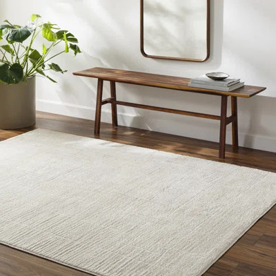 Aviyana Solid Color Machine Woven Polyester Area Rug in Cream | Wayfair North America