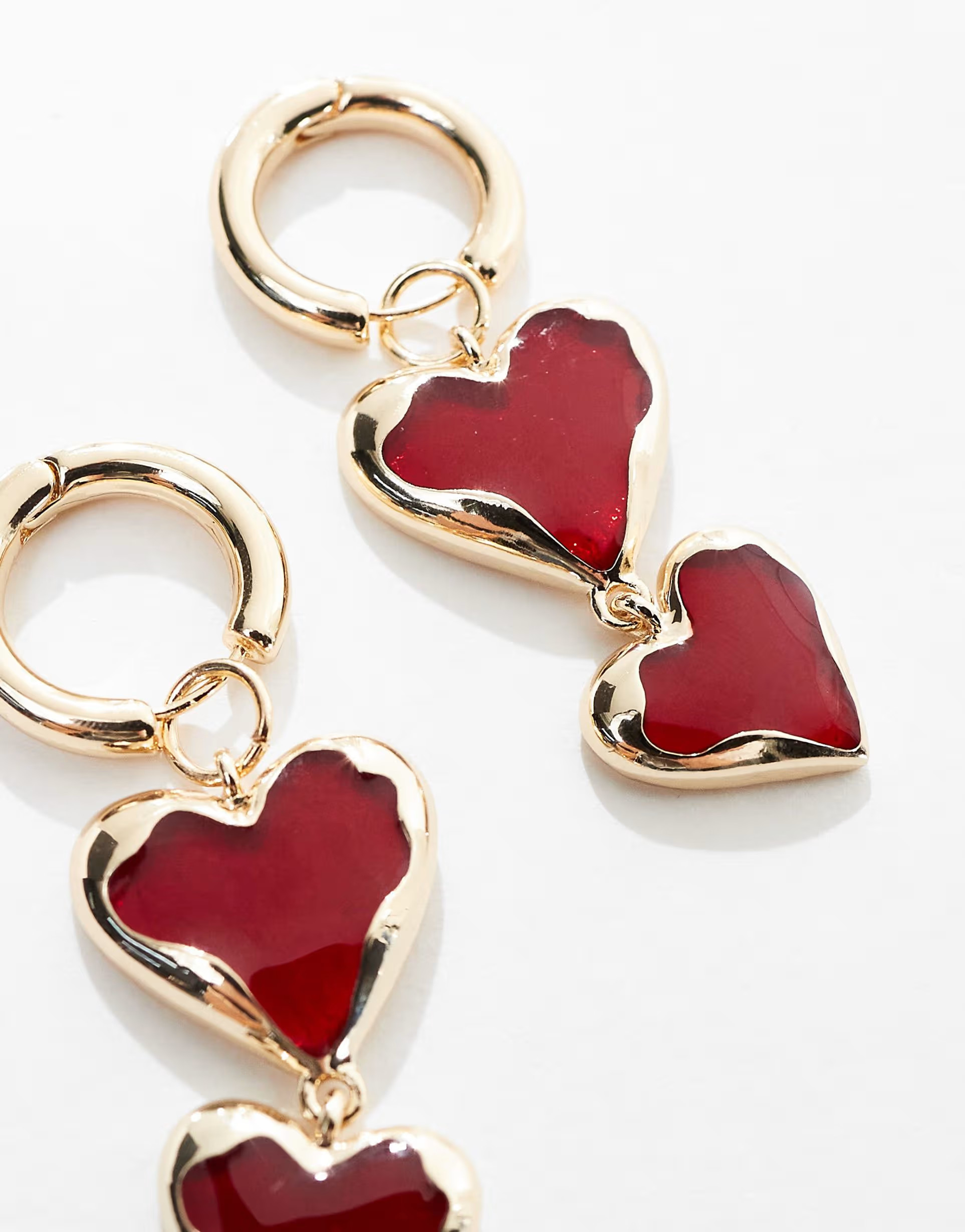 ASOS DESIGN drop earrings with red heart detail in gold tone | ASOS (Global)