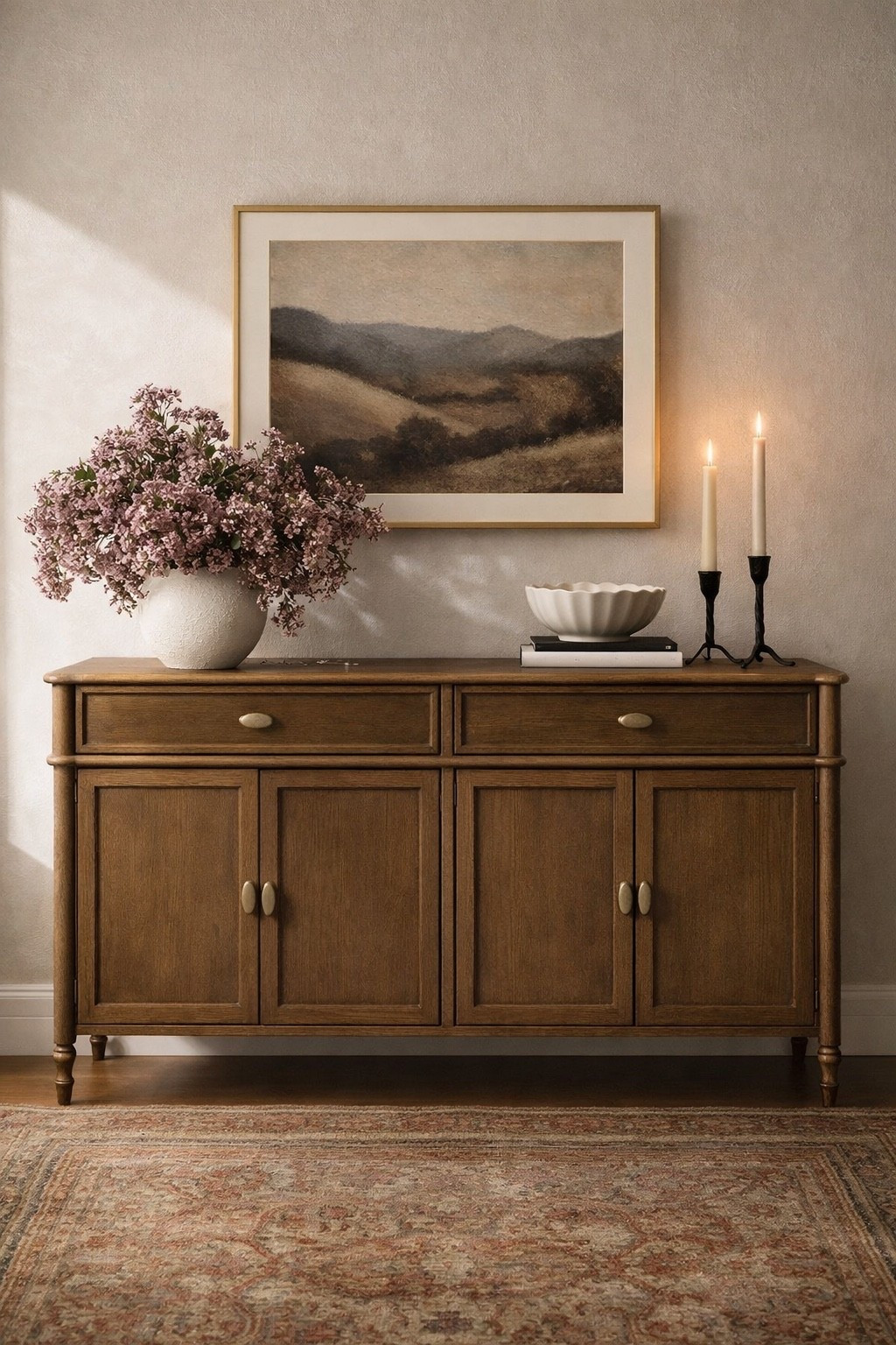 Drooling over this sideboard cabinet! Love the wood tone, brass accents and the detailing. Definitely a storage must-have that warms up any space!

#LTKHome