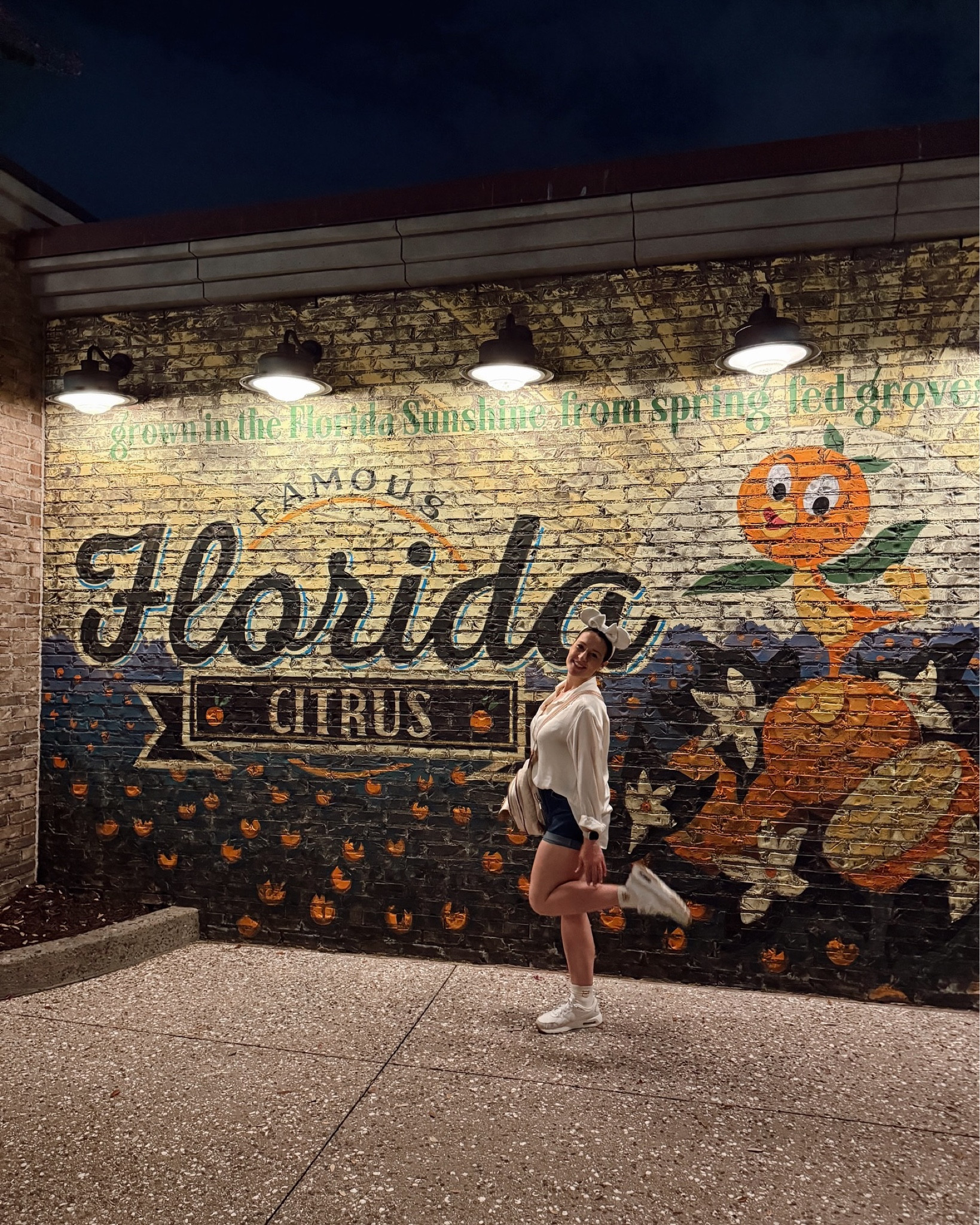 Last night we parked in the Orange Garage and passed by the sweetest little mural! I have probably walked by it a bajillion times and never noticed it! We love orange bird! 

#orangebird #orangegarage #disneytrip #vacationoutfit #jeanshorts #momoutfit #momclothes #cutemom #satinshirt #widelegjeanshorts #anklesocks #winniethepooh #airmax #nike 

#LTKTravel #LTKBeauty #LTKStyleTip
