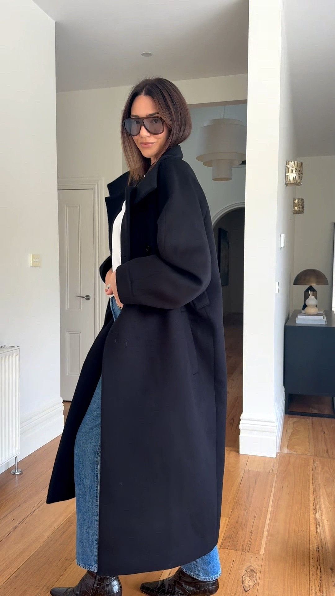 Coat season! 

Oversized black coat
White tee 
High rise straight leg denim  
Low heel ankle boot 
Oversized sunglasses 
Suede bag 

#LTKstyletip #LTKaustralia #LTKautumn