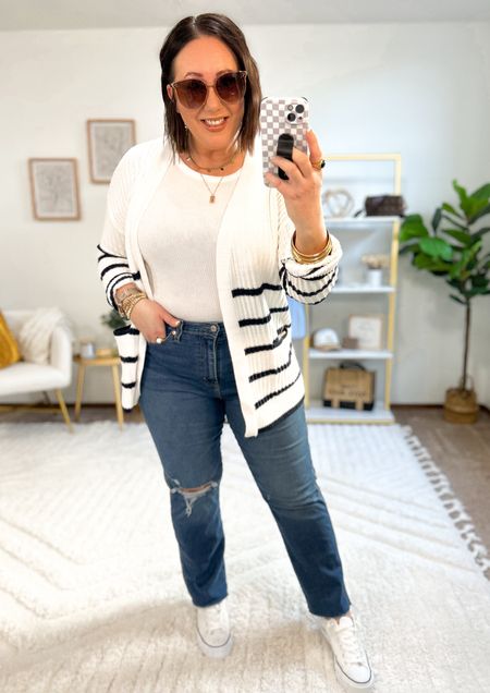 New open stitch cardigans at Walmart. Love the stripes!  Size large in mine. Fit tts.  The perfect layering piece going into spring. 
XXL tank. Size 14 jeans. Sneakers run big.  Size down. 


#LTKSeasonal #LTKfindsunder50 #LTKmidsize