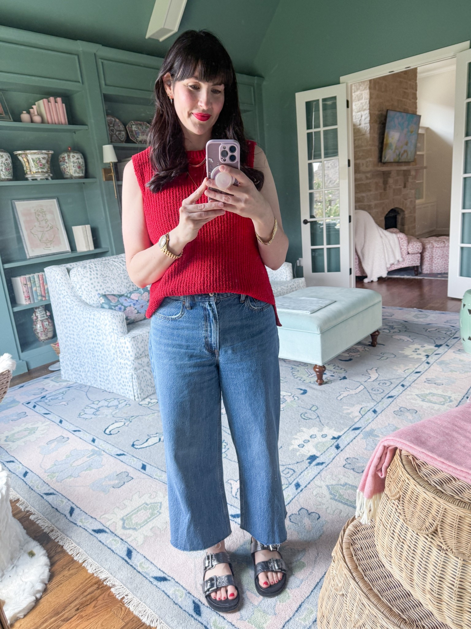 Red sleeveless sweater, wide leg jeans, pewter sandals 

#HOCWinter

#LTKOver40 #LTKMidsize #LTKFindsUnder100