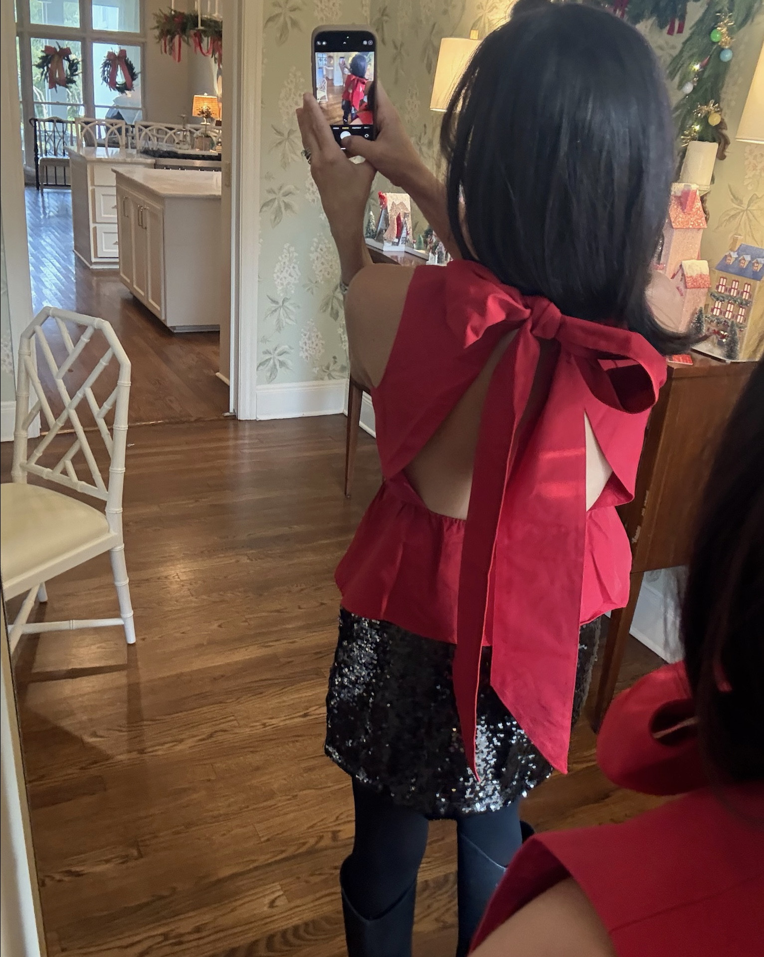 Obsessed with this holiday halter top with the cute bow detail!!! 

#LTKHoliday #LTKFindsUnder50 #LTKSaleAlert