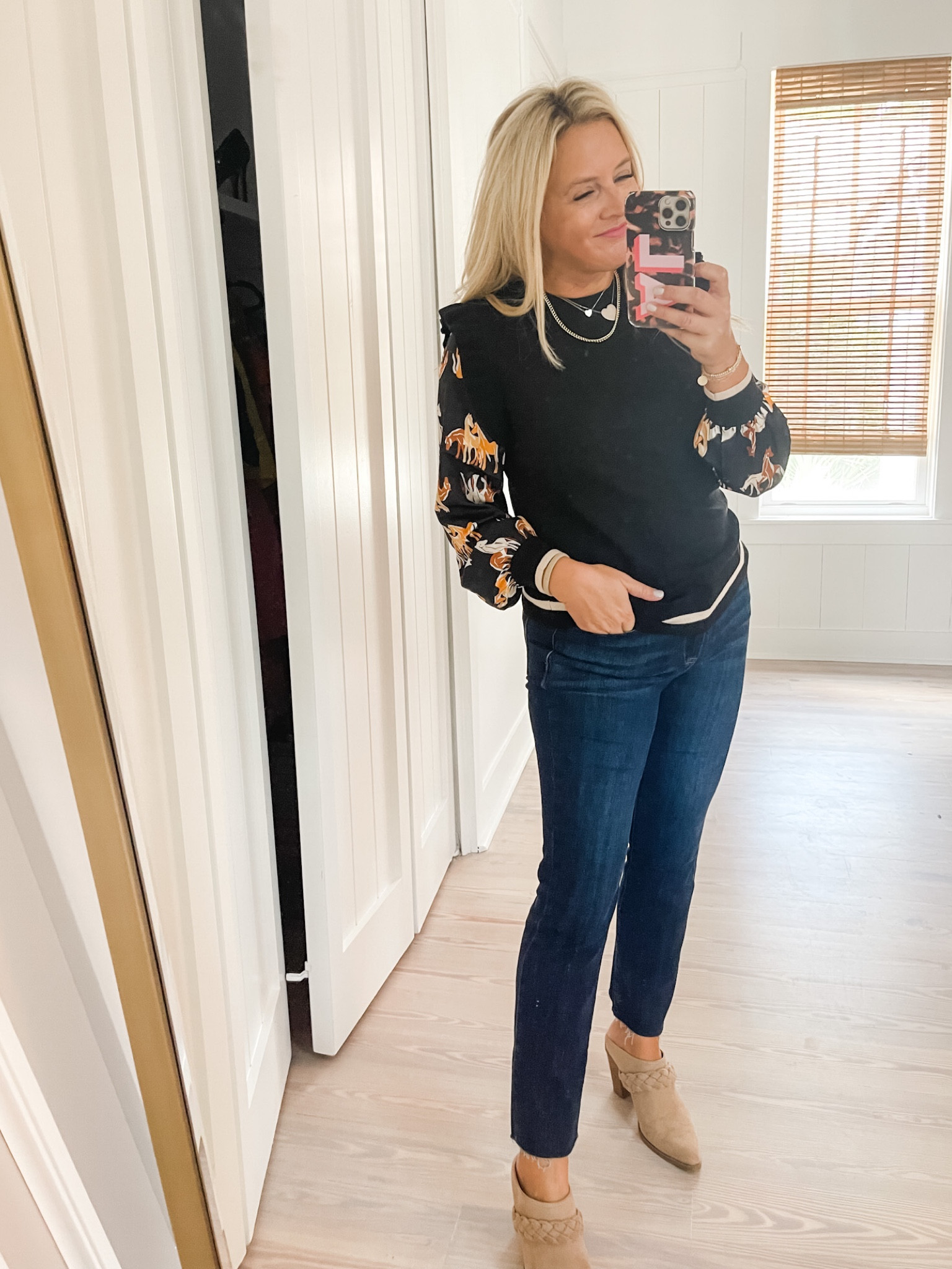 Two in one top. Sweater vest with the cutest horse print. Wearing a small. Code FANCY15 for 15% off  

#LTKsalealert #LTKunder100 #LTKstyletip