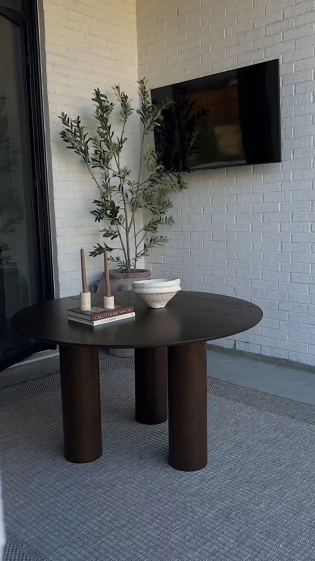 Part 2 | My vision for this outdoor space is minimalistic, organic & cozy! 🌱 The Baguette 52” Modern Oakwood Round Dining Table from @thepopmaison is just that! The 3-leg design detail really hones in to that style & adds visual interest - just perfection! 

#LTKHome