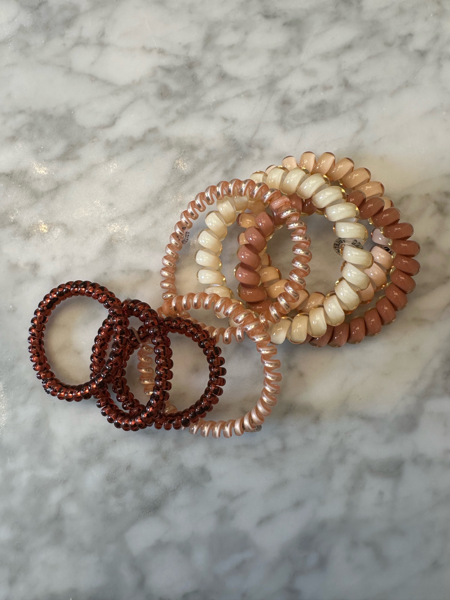 Favorite hair ties. I use these for working out, and whenever I have a bun in my hair. They don’t make a dent in your hair if you use them on wet hair. There are the small and large size. 

#LTKbeauty #LTKfindsunder50