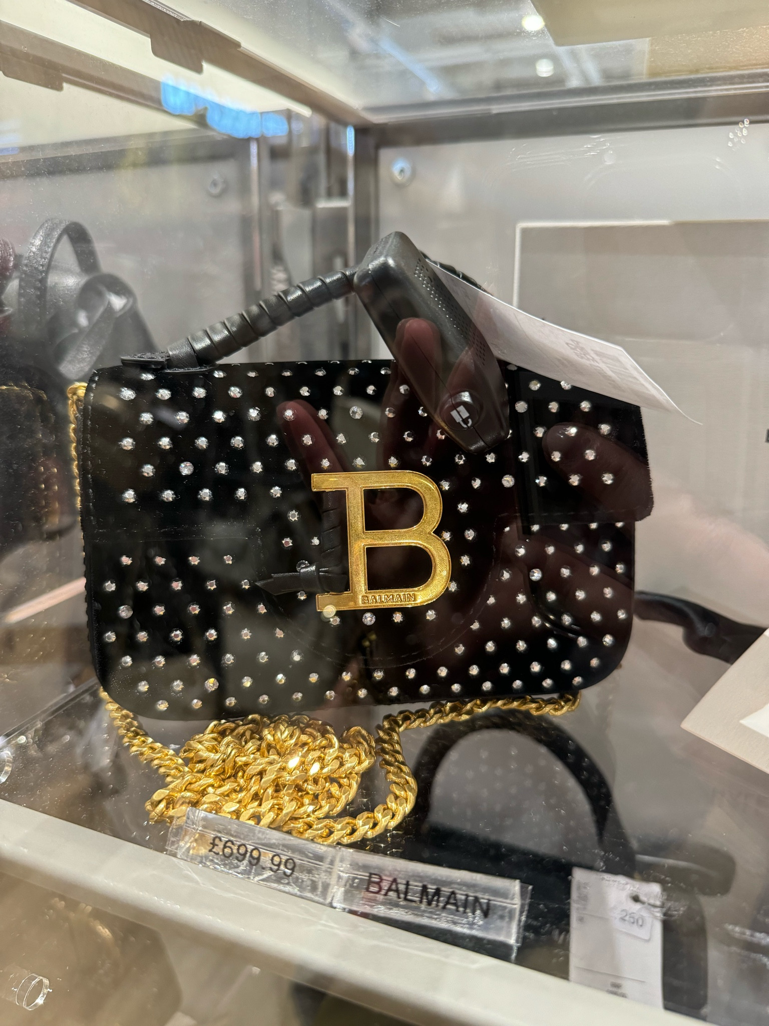 this balmain velvet black shoulder bag is available in the tk-maxi store in westfield white city for £699.99 and it retails for almost double !! 

not available on tkmaxx’s website but i’ve tagged it below where i’ve found it on other websites 🤍🤍

#LTKbag #LTKluxury #LTKeurope