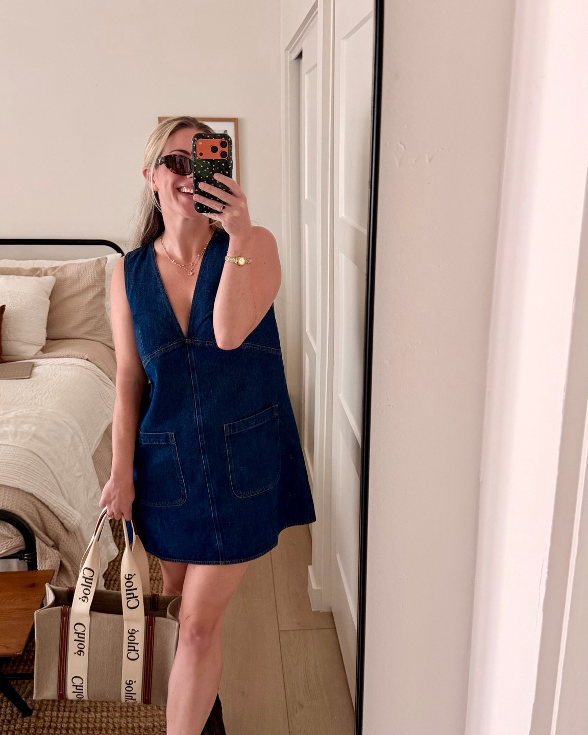 first september saturday 🍂🤎

when you’re ready to dress for fall but the weather absolutely is not 😂 the Sézane Many dress is such an easy transitional piece — lightweight enough for these hot september days, but the dark denim + ankle boots make it feel instantly fall.

added my favorite oversized tote + gold accessories and called it a day. effortless saturday outfit perfection 🫶🏻

everything linked below ↓

#LTKootd #LTKSeasonal #LTKNYFW