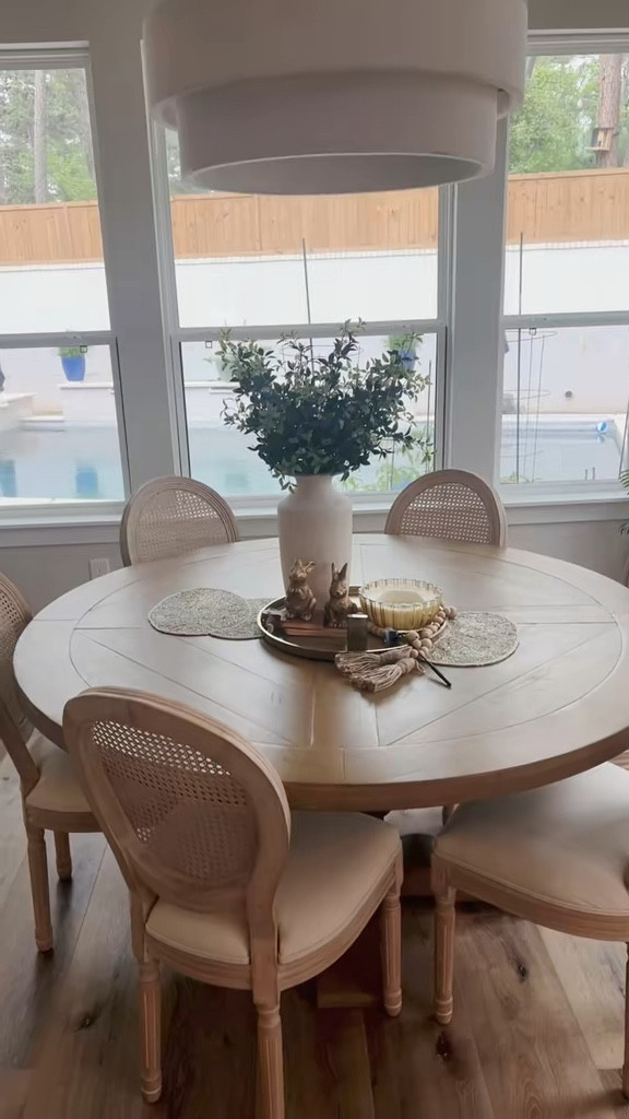 This round table is a win! Soft woods, cozy tones, and layered textures 🤍 #DiningRoomDecor

#LTKHome
