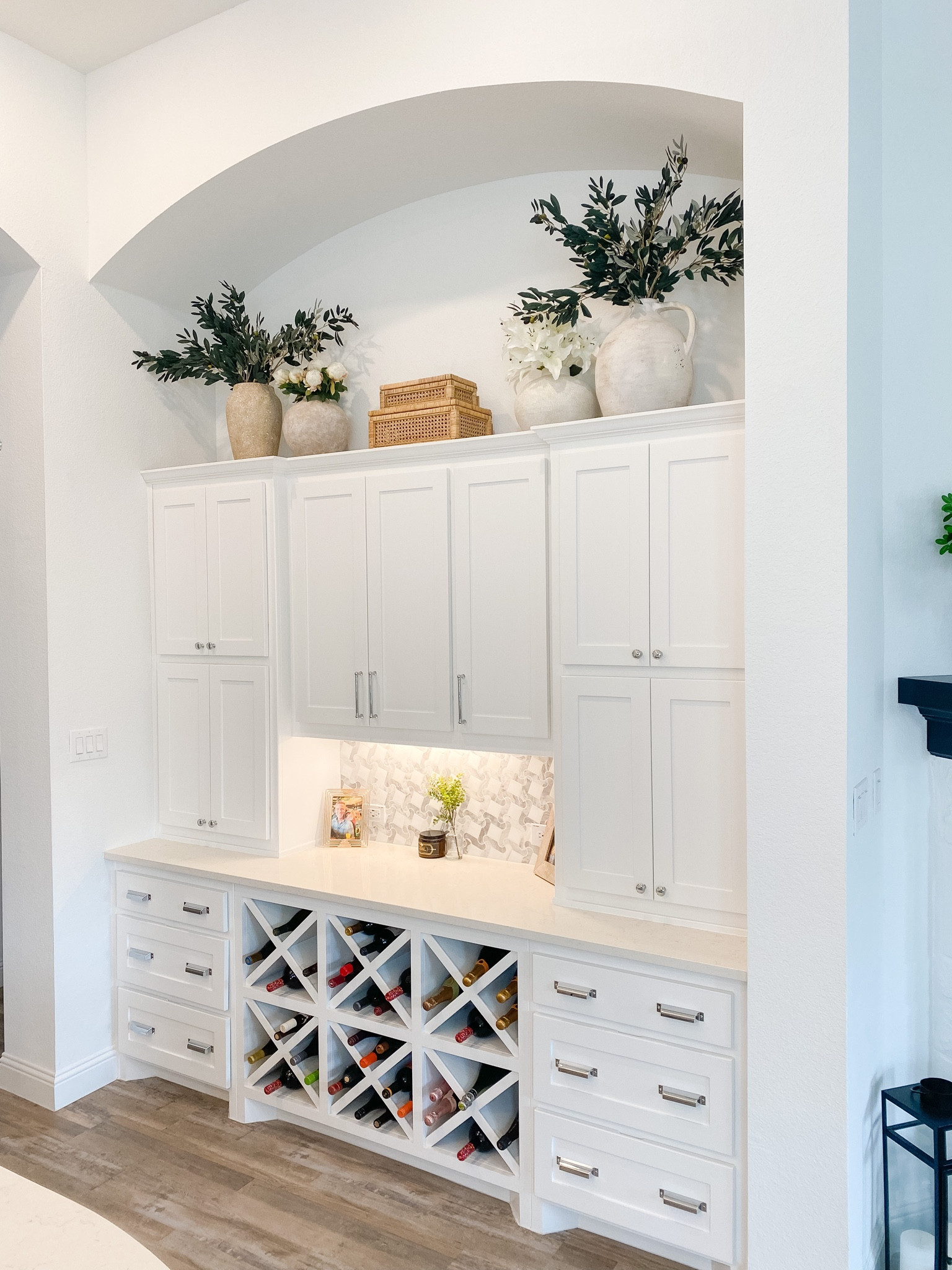 Cabinet decor
Above cabinet
Faux stems
Vases
Florals
Olive stems
Kitchen decor 

#LTKhome #LTKFind