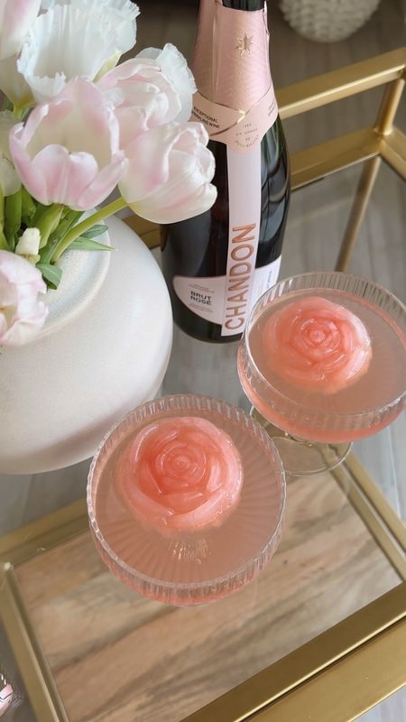 Mimosa ice cubes 🍾🌸 #mimosa #brunch #easter #mothersday #champagne #bachelorette #amazon #amazonfind #hosting #barcart #coupeglasses #icemold 

#LTKhome #LTKSeasonal #LTKFind