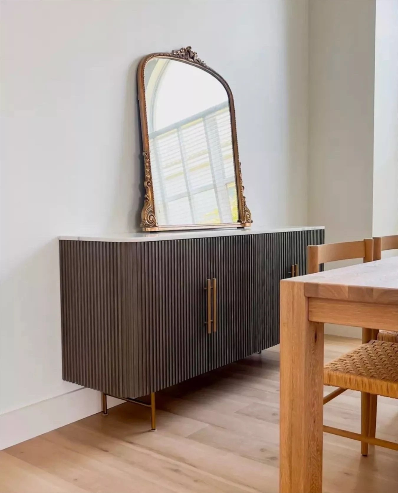 This gorgeous mirror and sideboard are honestly such a stunning combo — the kind of pieces that instantly make a space feel so elevated and intentional!

home styling, statement mirror, sideboard decor, interior inspo, modern classic, furniture finds, wall decor

#LTKHome