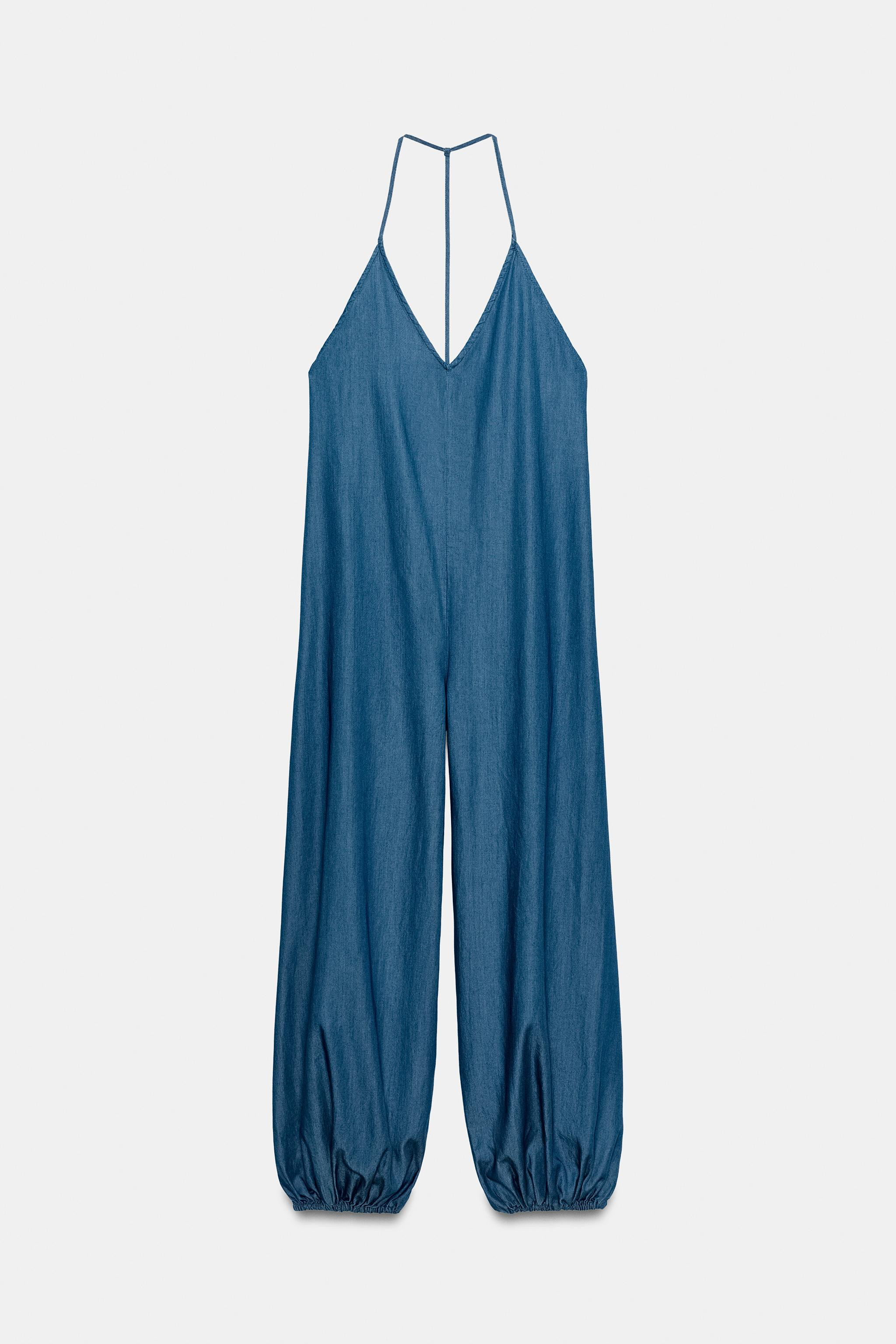 Jumpsuit made of lyocell blend yarn. V-neck and thin straps. Elastic cuffed hem. | Zara US