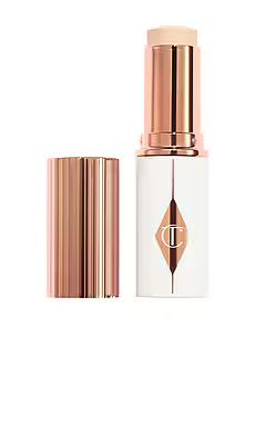 Charlotte Tilbury Unreal Skin Sheer Glow Tint Hydrating Foundation Stick in 1 Fair from Revolve.c... | Revolve Clothing (Global)