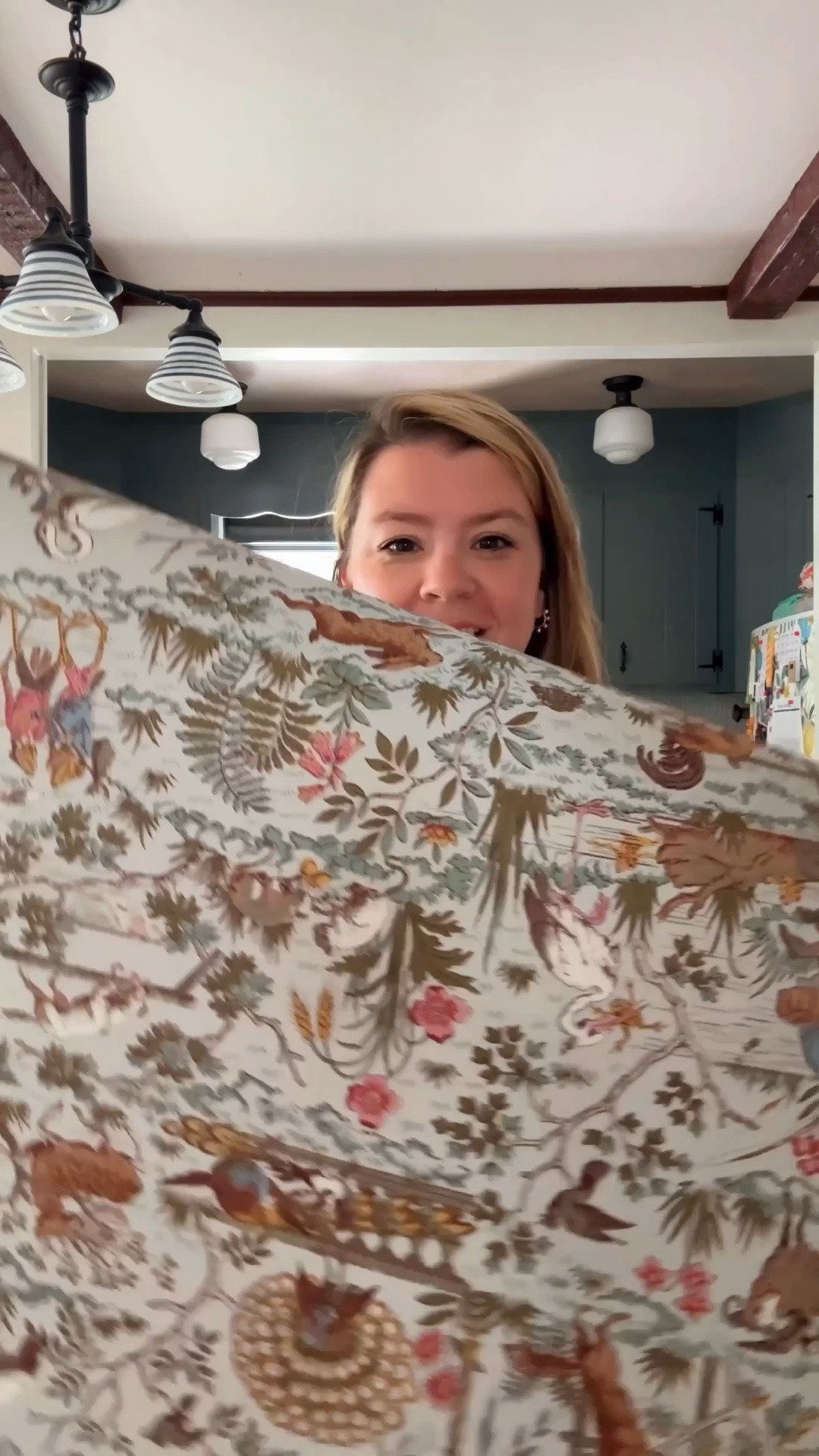 Do you remember a few weeks back when I asked you to vote on a new wallpaper for my kitchen? Get ready for the grand reveal:  I went with artscape's Fable Petite print thanks to your votes. 

This isn't my first rodeo with removable wallpaper so I went in with some skills, but artscape actually sends a smoother tool and fresh box cutter with their paper, so that made the process all the easier. It was so satisfying to see each piece go up on the fridge, it's such a simple and affordable upgrade that makes our very ancient and basic refrigerator look kind of lux!  I love how the pattern matches with the cabinets and gives the space a really cozy, cottage-y look.  #domestikatehome #removablewallpaper #kitchendiy

#LTKHome